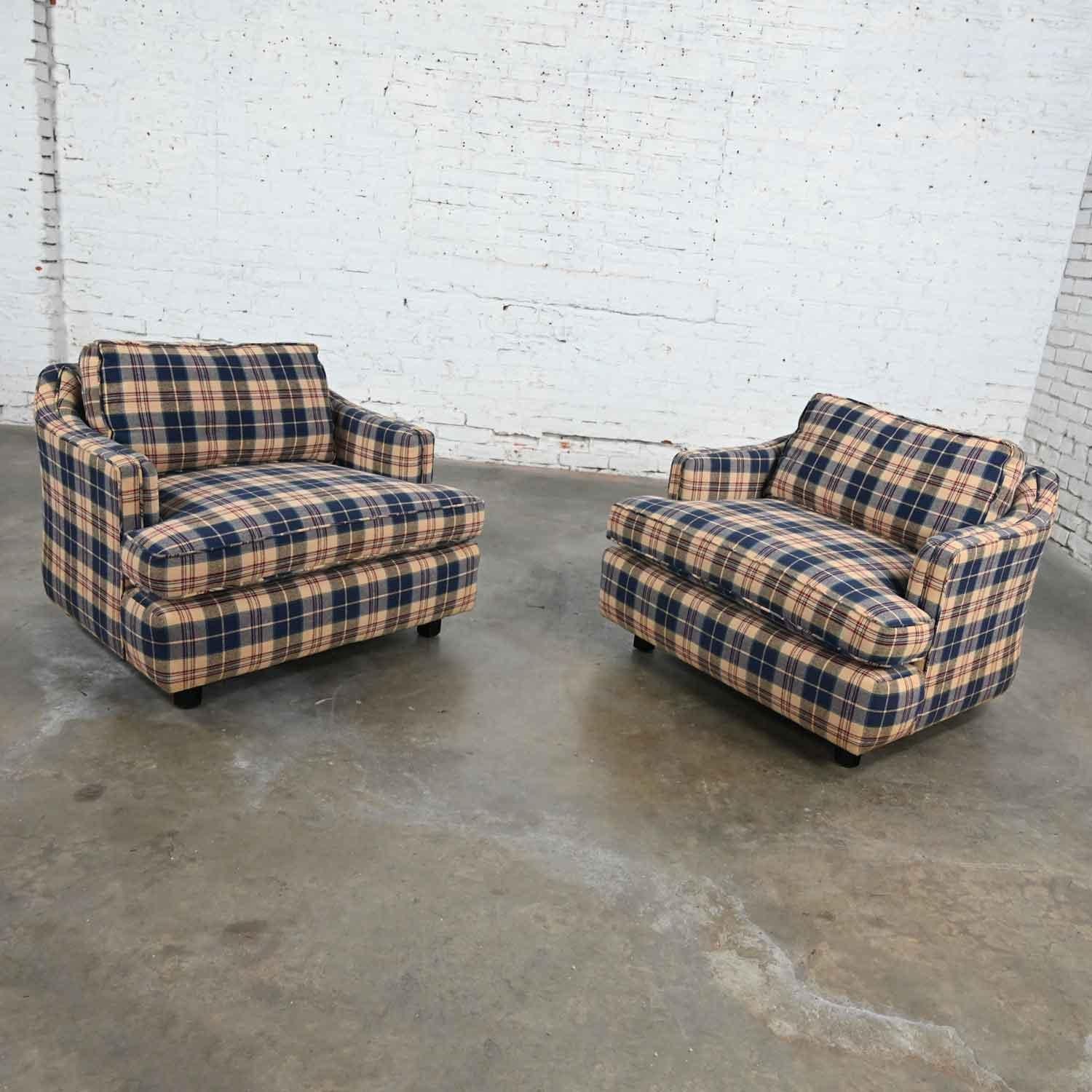 Fabulous vintage blue, khaki, maroon, and black plaid rounded corners and flat back barrel club chairs with black painted wood octagon legs. Beautiful condition, keeping in mind that these are vintage and not new so will have signs of use and wear.