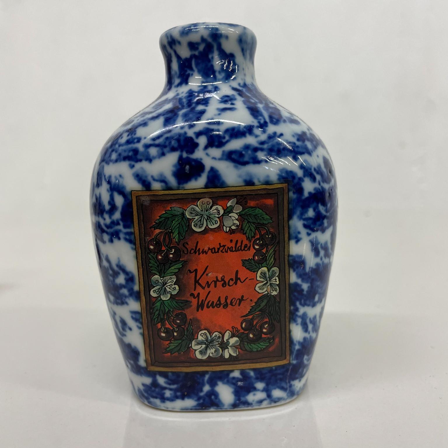 Bottle
Elegant vintage beautiful mottled blue Schwarzwalder Kirschwasser Ceramic Brandy Cherry Bottle BAVARIA
Maker stamp 
Measures: 4.25 h x 2.75 w x 2.13 d
Preowned original vintage condition. No stopper.
Refer to images,




