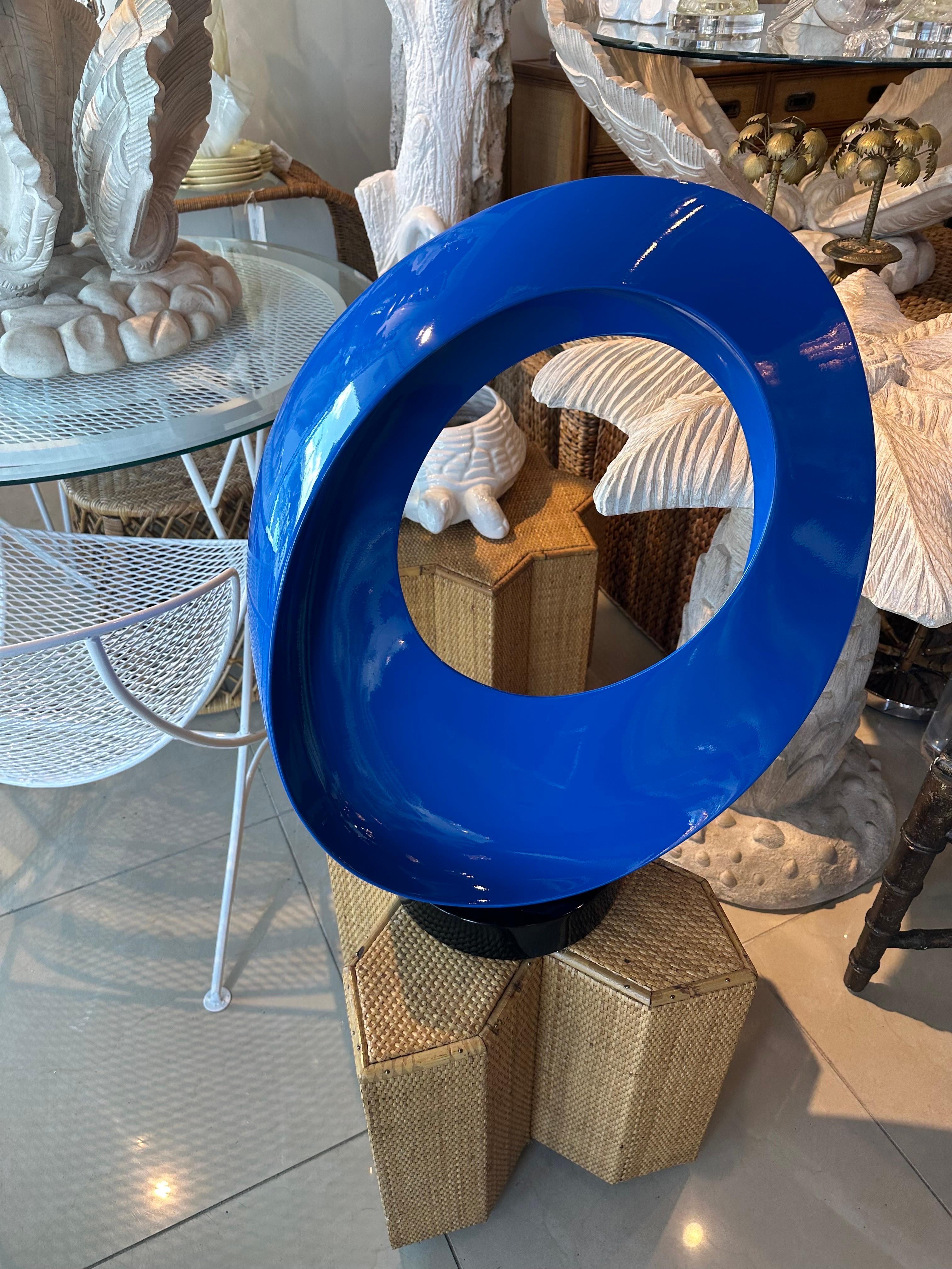 Beautiful vintage modern, abstract freeform round statue. This has been newly lacquered in a vibrant blue, black base. Dimensions: 23 H x 19 W x 8 D. 