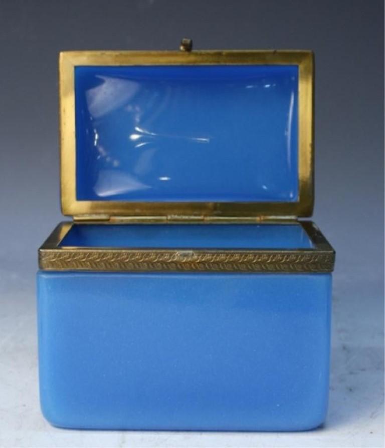 Vintage 20th century blue opaline glass vanity box with brass setting; unmarked. Hinge in good working order and good condition interior.