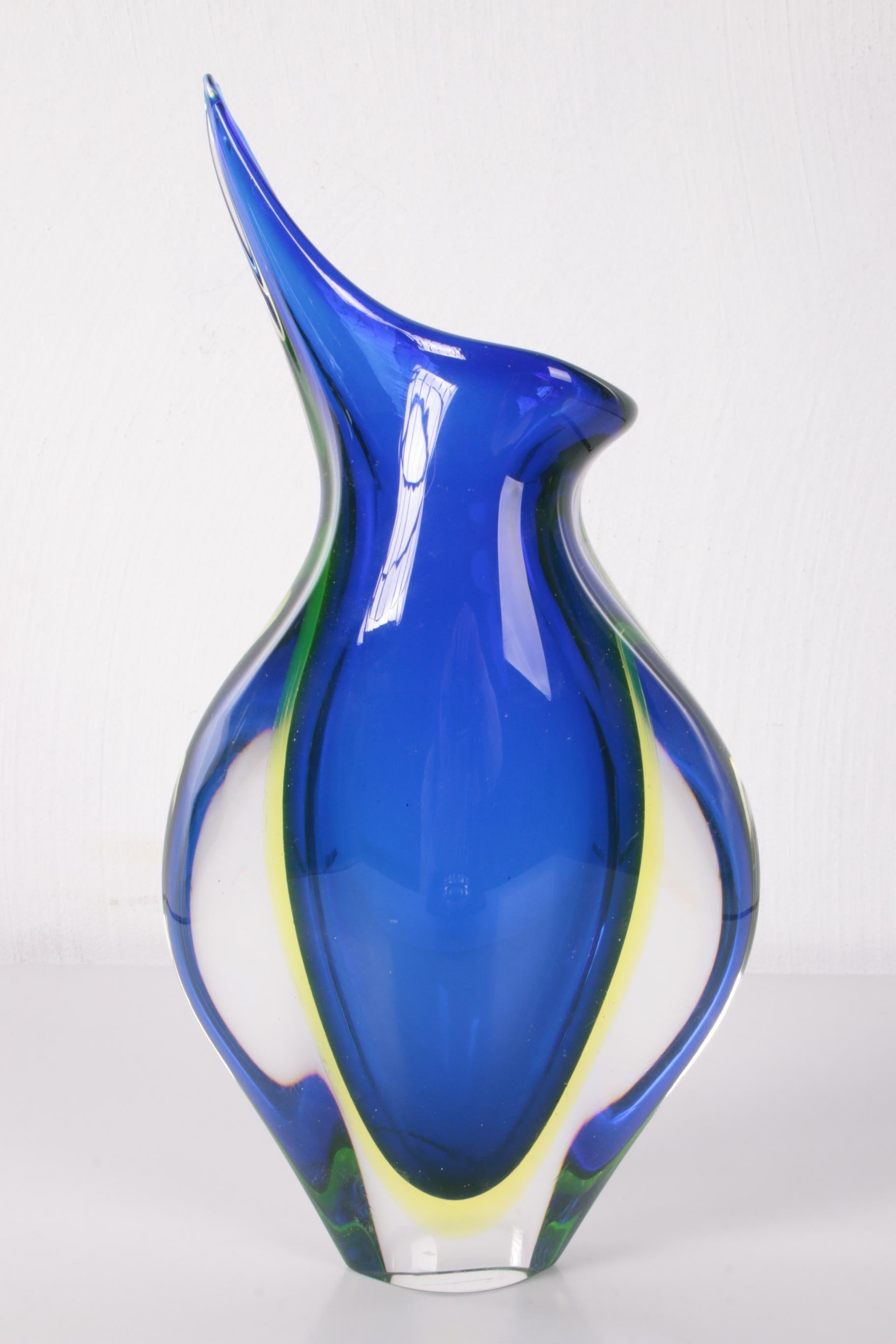 Vintage blue pointed vase of Murano glass with uranium or Annegreen, 1960s


Beautiful rare pointed vase with blue and yellow/green of uranium or Annegroen.

Uranium has been used in this process to get this wonderful result.

Made in Italy