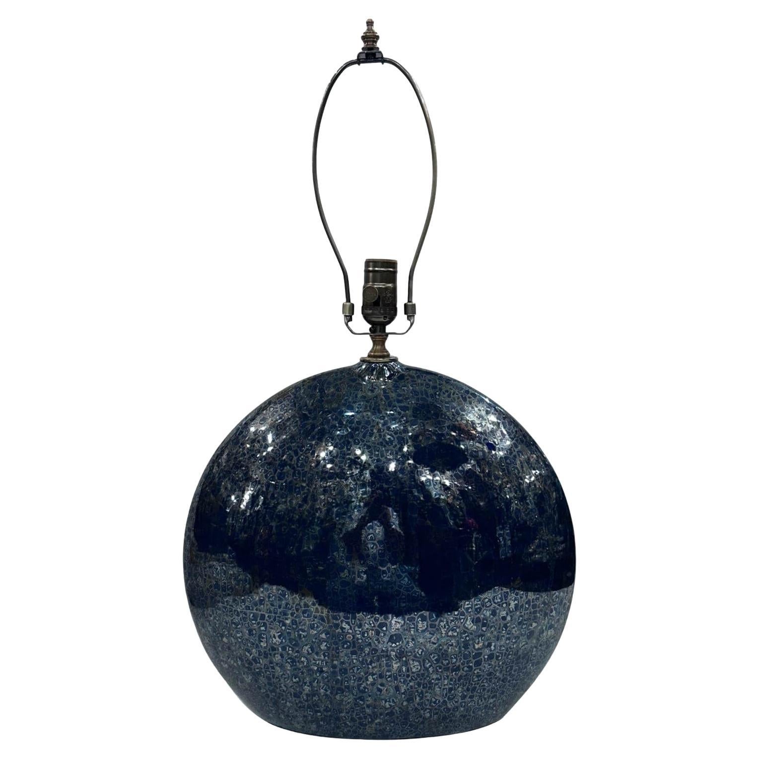 A pair of circa 1970's Italian blue porcelain table lamps.

Measurements:
Height of body: 15