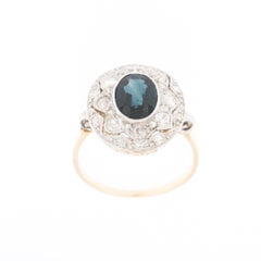 Vintage Blue Sapphire and Diamonds 18 karat Yellow and White Gold Ring
