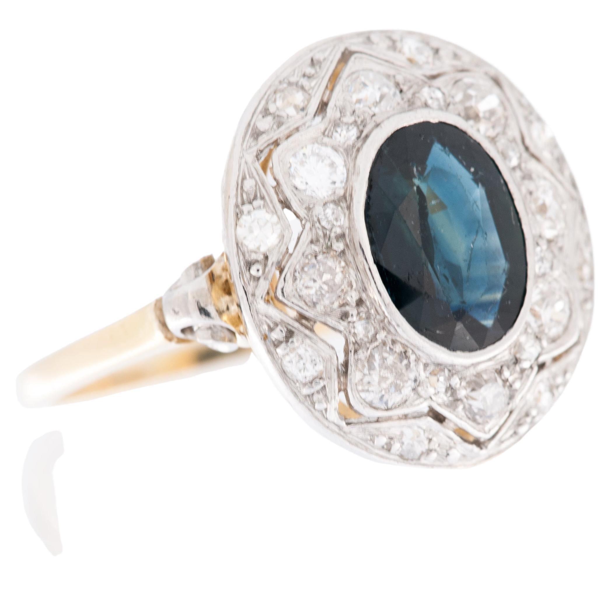 Vintage Ring mit blauem Saphir und Diamanten aus 18 Karat Gelb- und Weißgold im Angebot