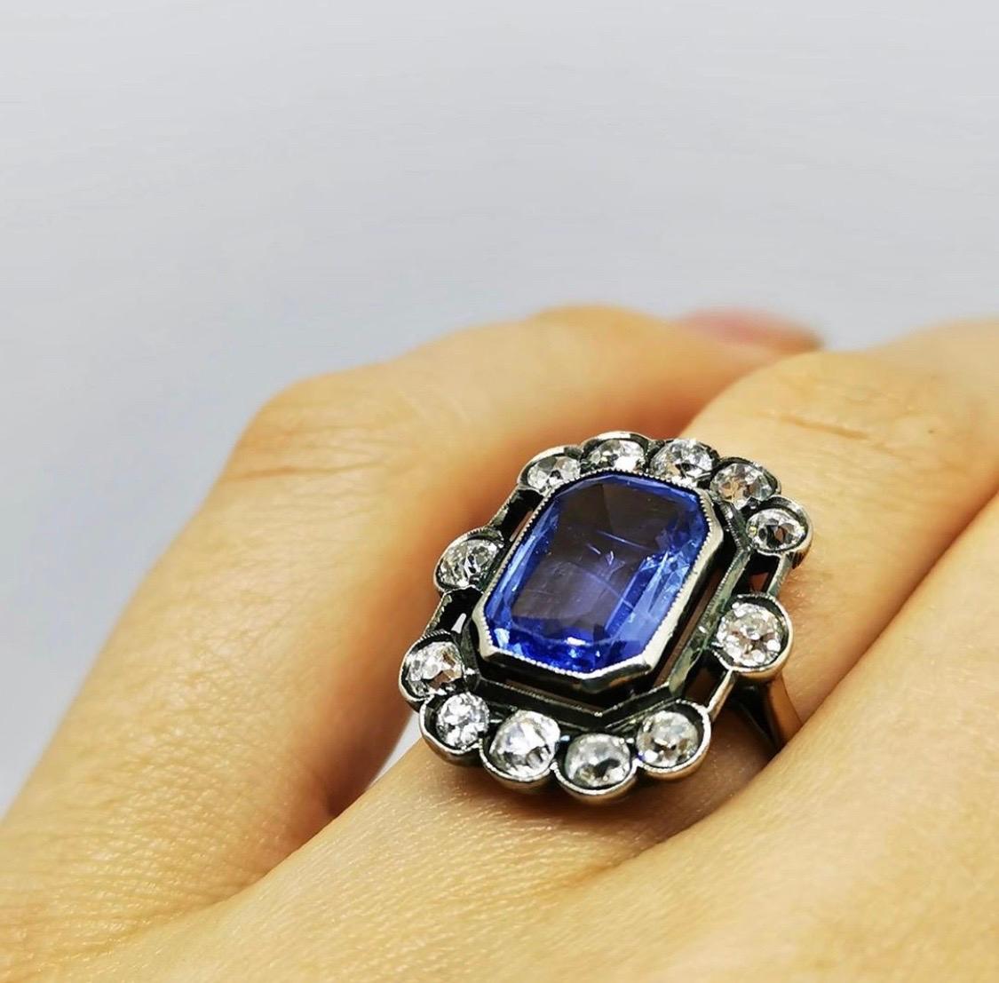Vintage blue Sapphire and Diamonds Ring

This stunning yellow gold ring is centered with blue octagonal cut sapphire that weighs approximately 4.0ct . The sapphire is accentuated by 12 sparkling old cut diamonds that weigh approximately 1.80ct.
The