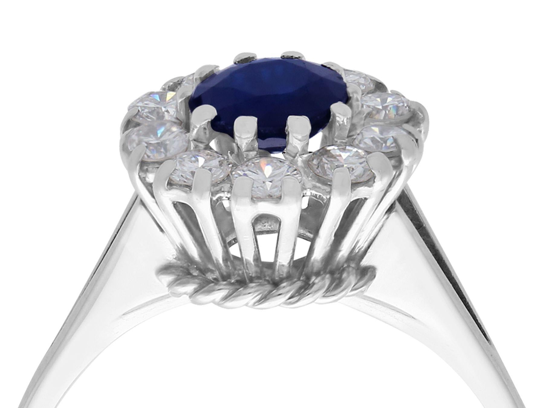 A fine and impressive vintage 0.78 carat natural blue sapphire and 0.74 carat diamond, 18 karat white gold dress ring; part of our vintage jewelry and estate jewelry collection

This blue sapphire and diamond ring has been crafted in 18k white