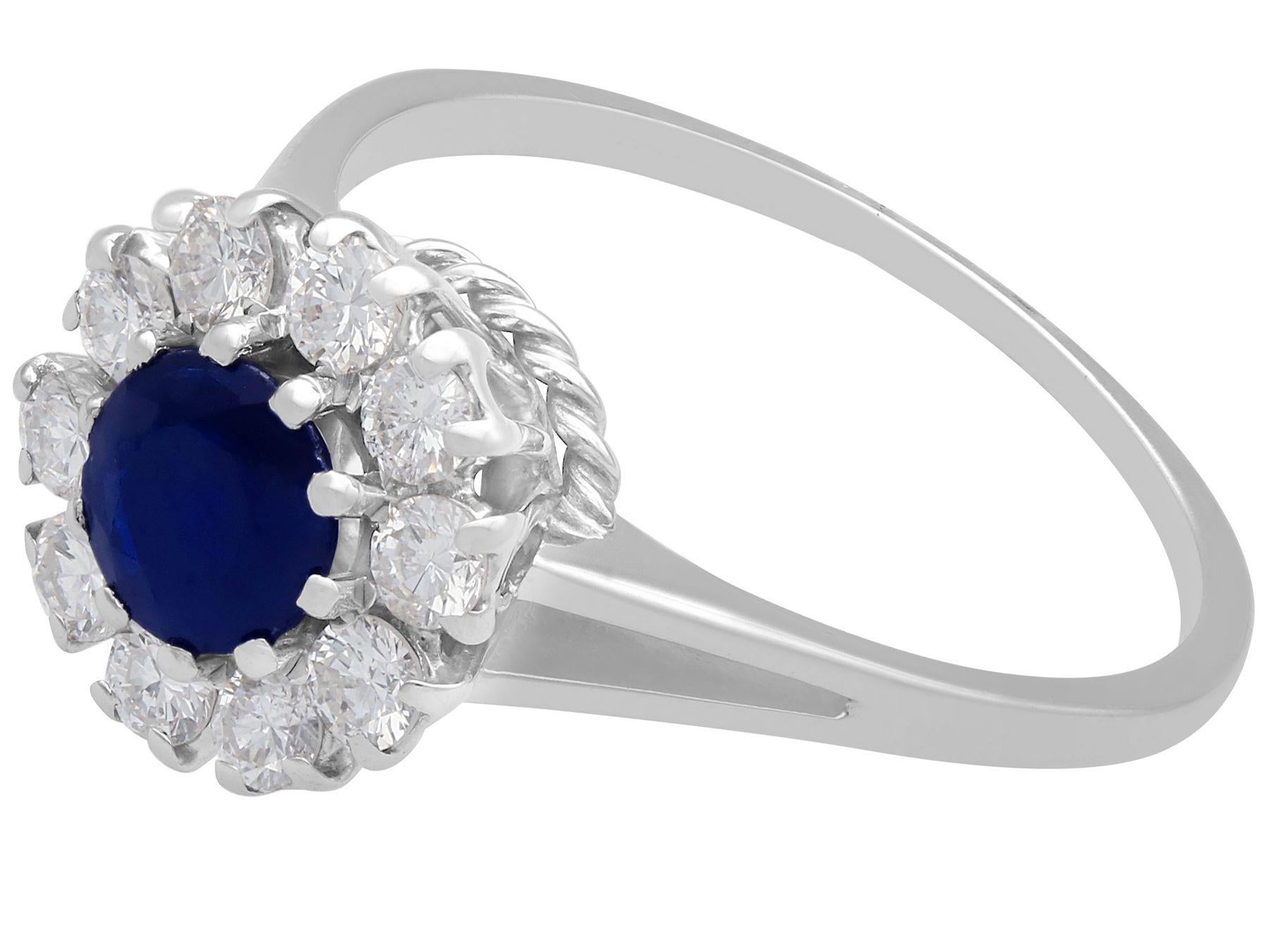 Round Cut Sapphire and Diamond Cluster Ring in White Gold For Sale