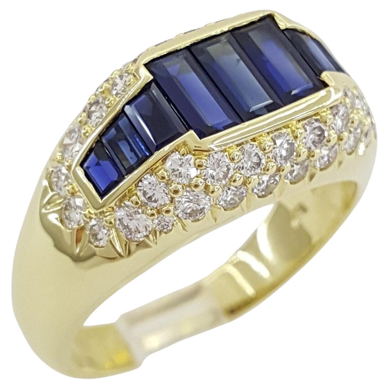Taille ronde Bague vintage en or jaune 18 carats avec saphir bleu et diamants ronds en vente