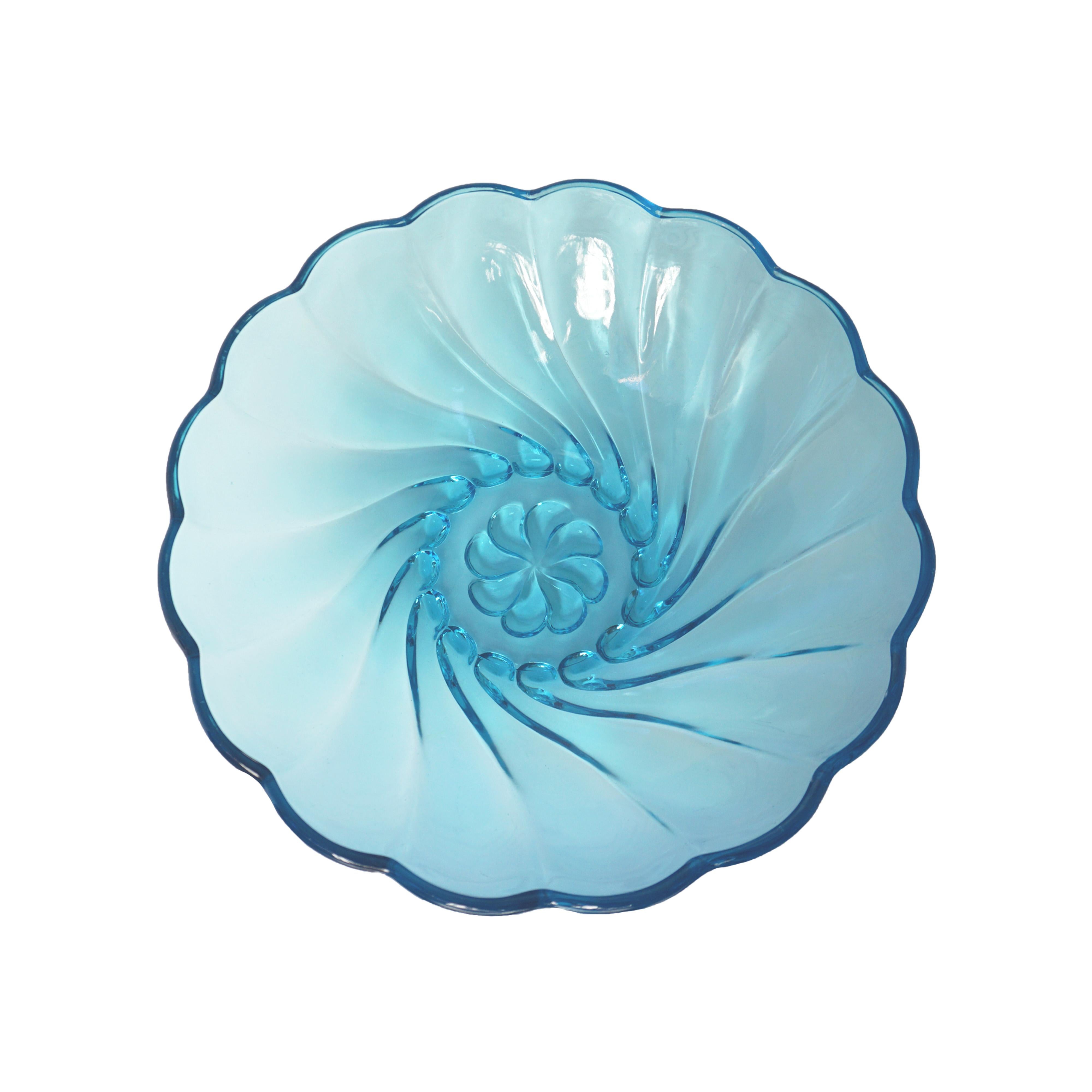 Vintage blue Seachell Swirl bowl, 1960s 

Glass
Measures: 9 x 3.25 in.

Vintage blue-colored glass bowl. Soft swirls adorn the exterior of the piece.



All sales are final.
  