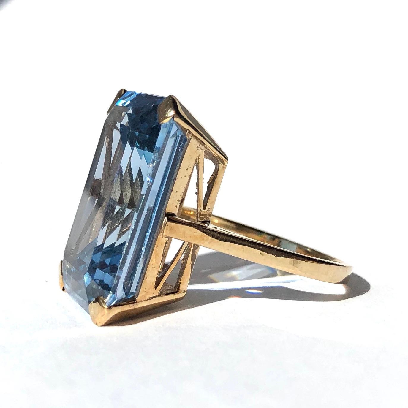 This ring is a sure show stopper! The colour of the blue spinel measures approximately 20ct and is so striking and the cut really shows this off and created almost a hall of mirrors effect! The stone is set in a simple claw setting and the ring is