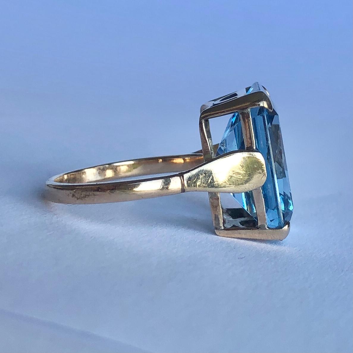 This ring is a sure show stopper! The blue spinel measures approximately 10ct and is so striking and the cut really shows this off. The stone is set in a simple claw setting and the ring is modelled in 9ct gold. 

Ring Size: N or 6 3/4
Stone