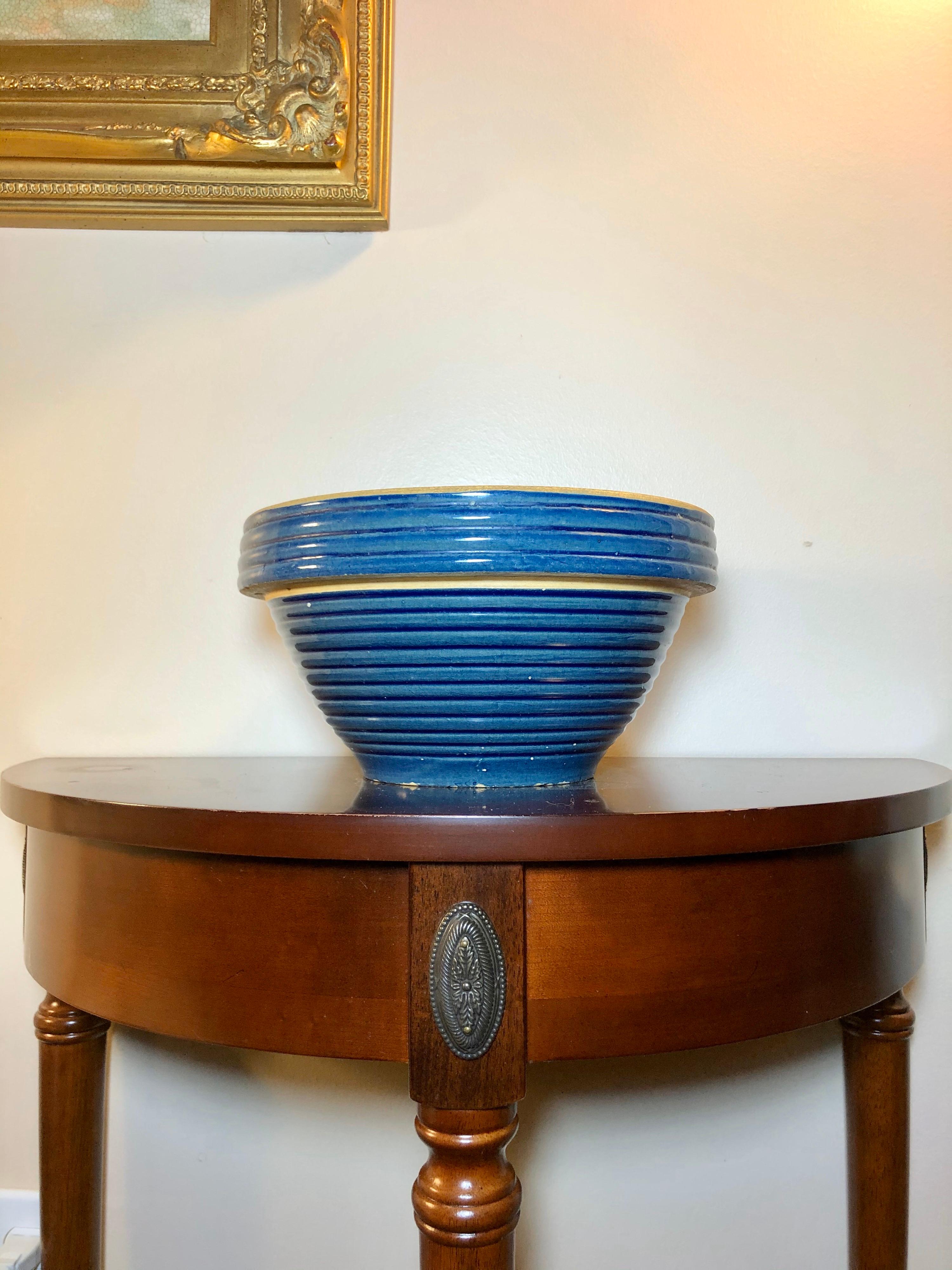 This cobalt blue stoneware mixing bowl is in excellent condition. Fired at very high temperatures, the mineral clay of stonewear melds together to create a very sturdy, non-porous surface. This cobalt blue color is one of the most sought-after and