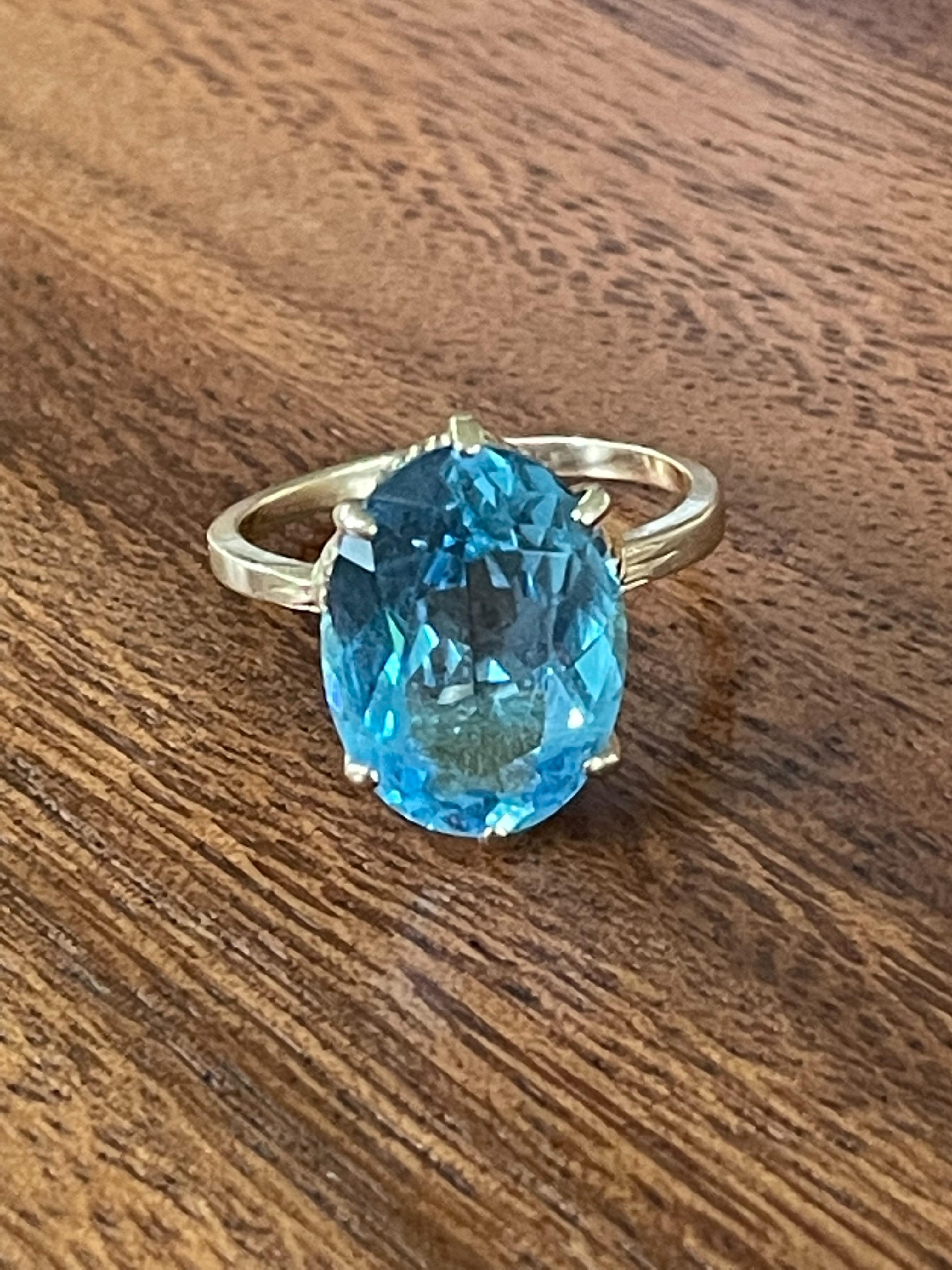 Oval Cut Vintage Blue Topaz 14 Karat Yellow Gold Ring For Sale
