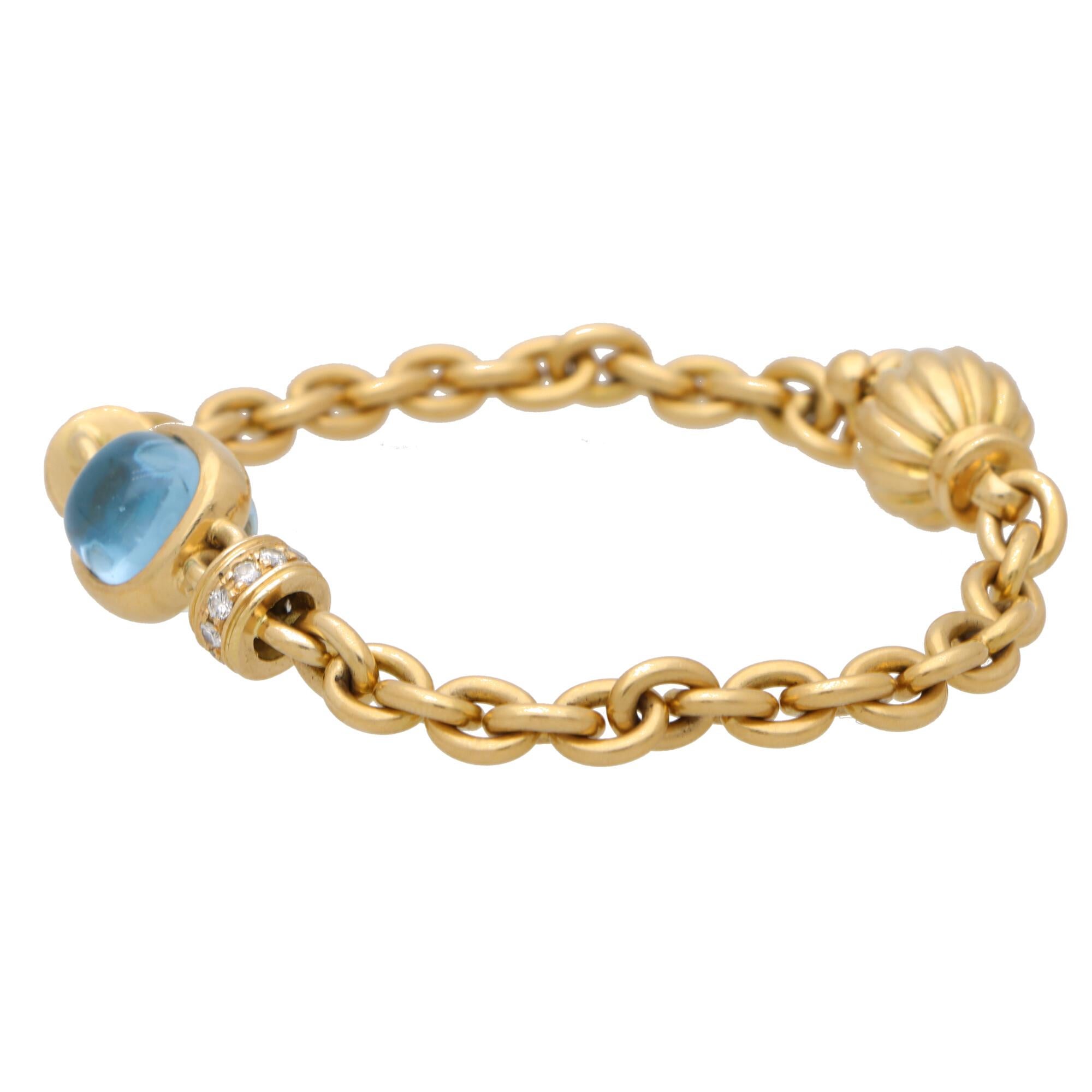 Schweres Gliederarmband mit blauem Topas und Diamanten aus 18 Karat Gelbgold (Retro)