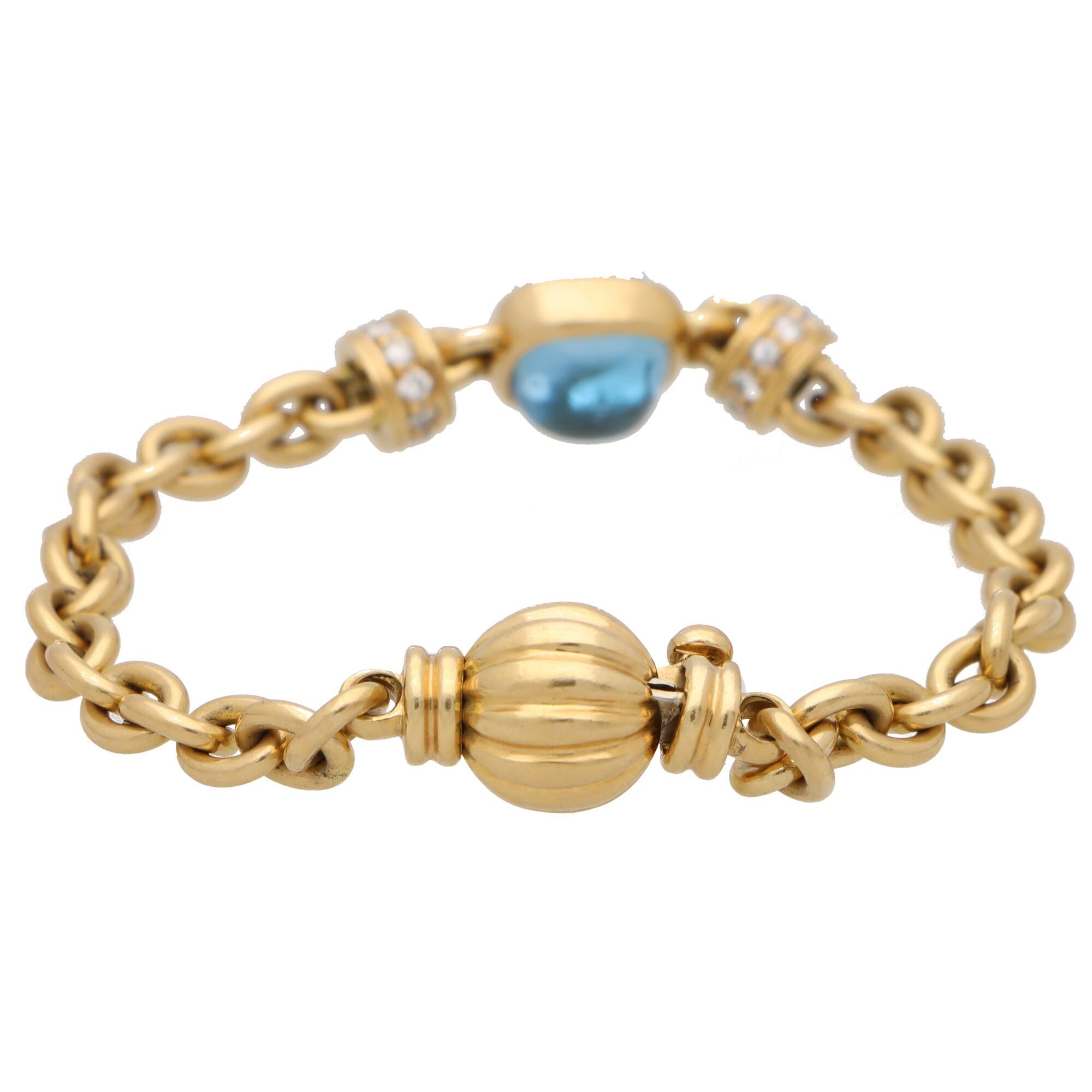 Schweres Gliederarmband mit blauem Topas und Diamanten aus 18 Karat Gelbgold im Zustand „Gut“ in London, GB