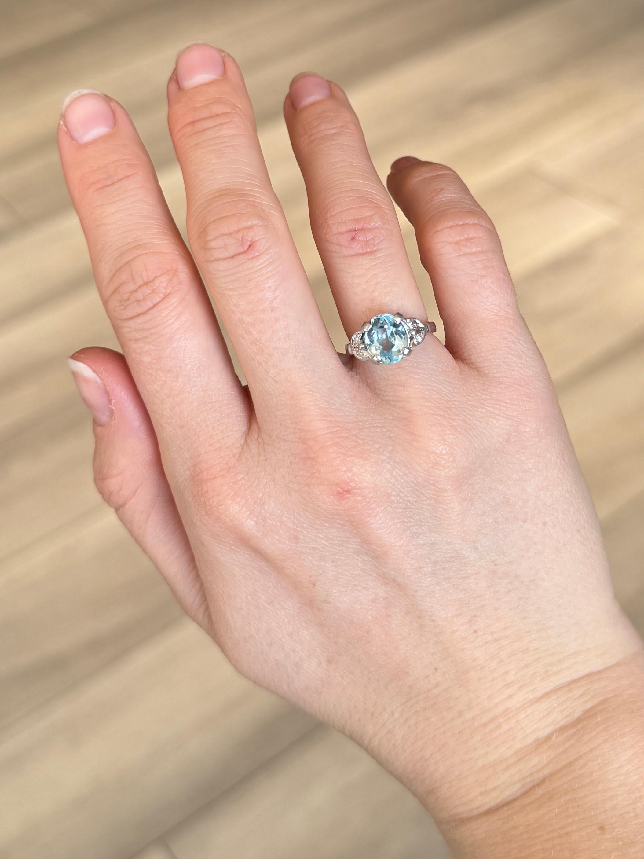 Oval Cut Vintage Blue Topaz and Diamond Platinum Ring For Sale
