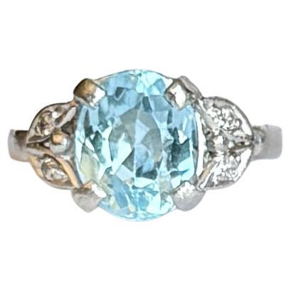 Vintage Blue Topaz and Diamond Platinum Ring For Sale