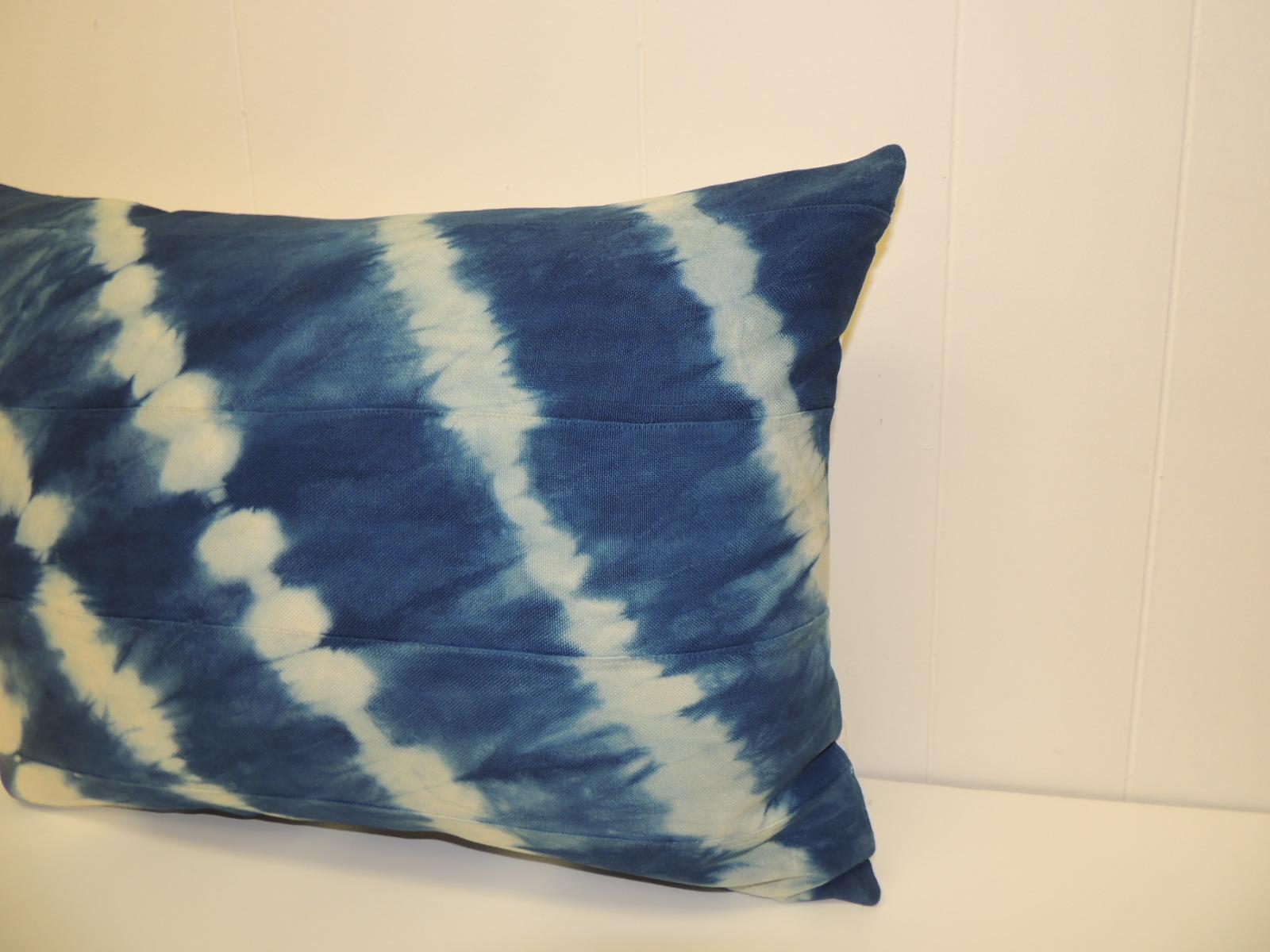 Vintage Indigo and White African Resist-dye Textile Decorative Pillow
Sunburst pattern square pillow with textured white silk backing.
Decorative pillow handmade and designed in the USA. 
Closure by stitch (no zipper) with custom made feather/down