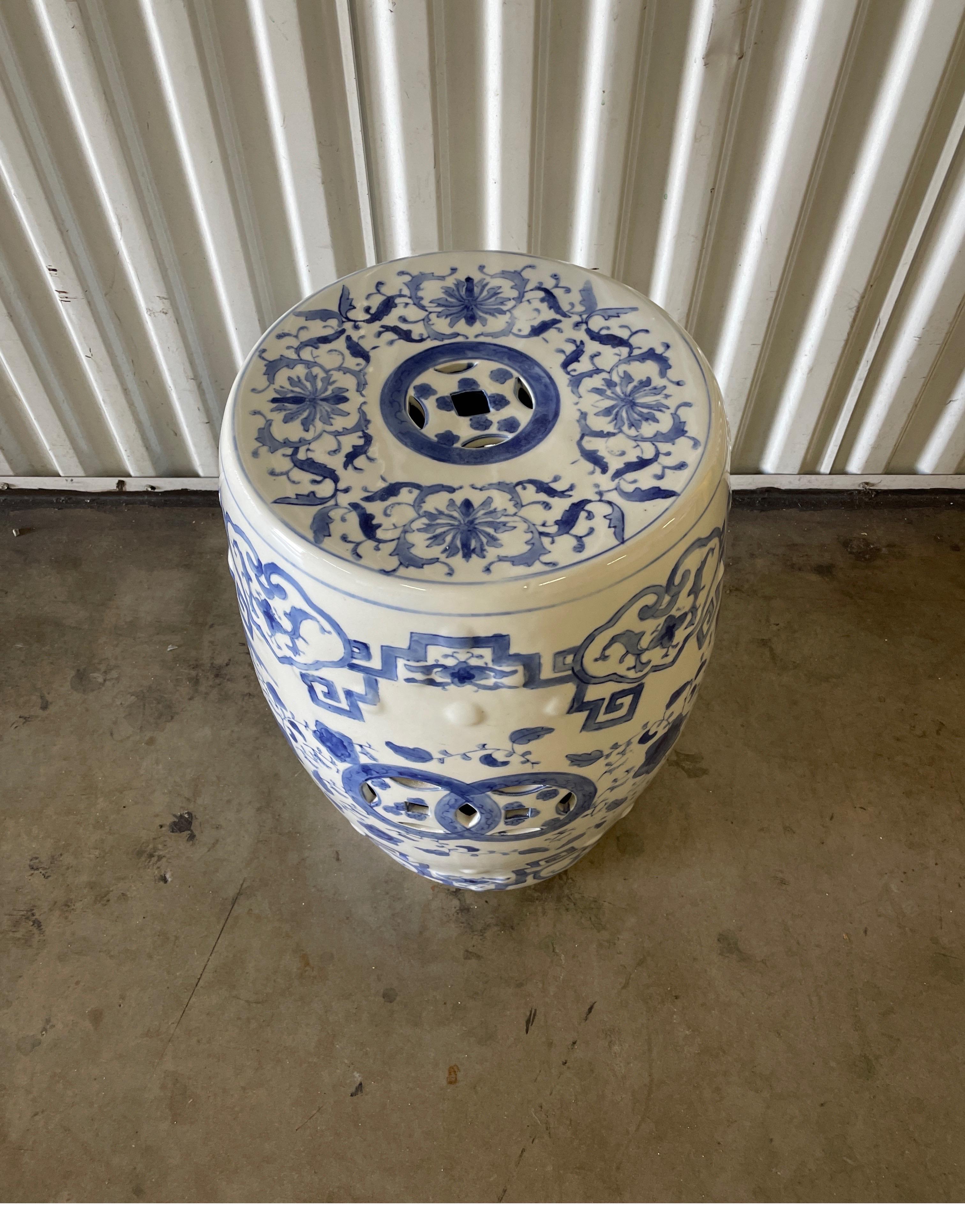 Vintage blue & white Chinese garden seat with an overall floral leaf design.
Will brighten up any setting.