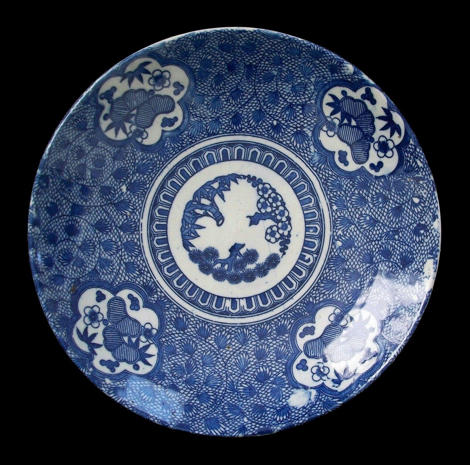 Vintage blue and white transfer decorated charger - wheel thrown body - unsigned - Japan - mid 20th century.

Excellent vintage condition - no loss - no damage - no restoration - glaze/body and transfer imperfections as part of the manufacturing