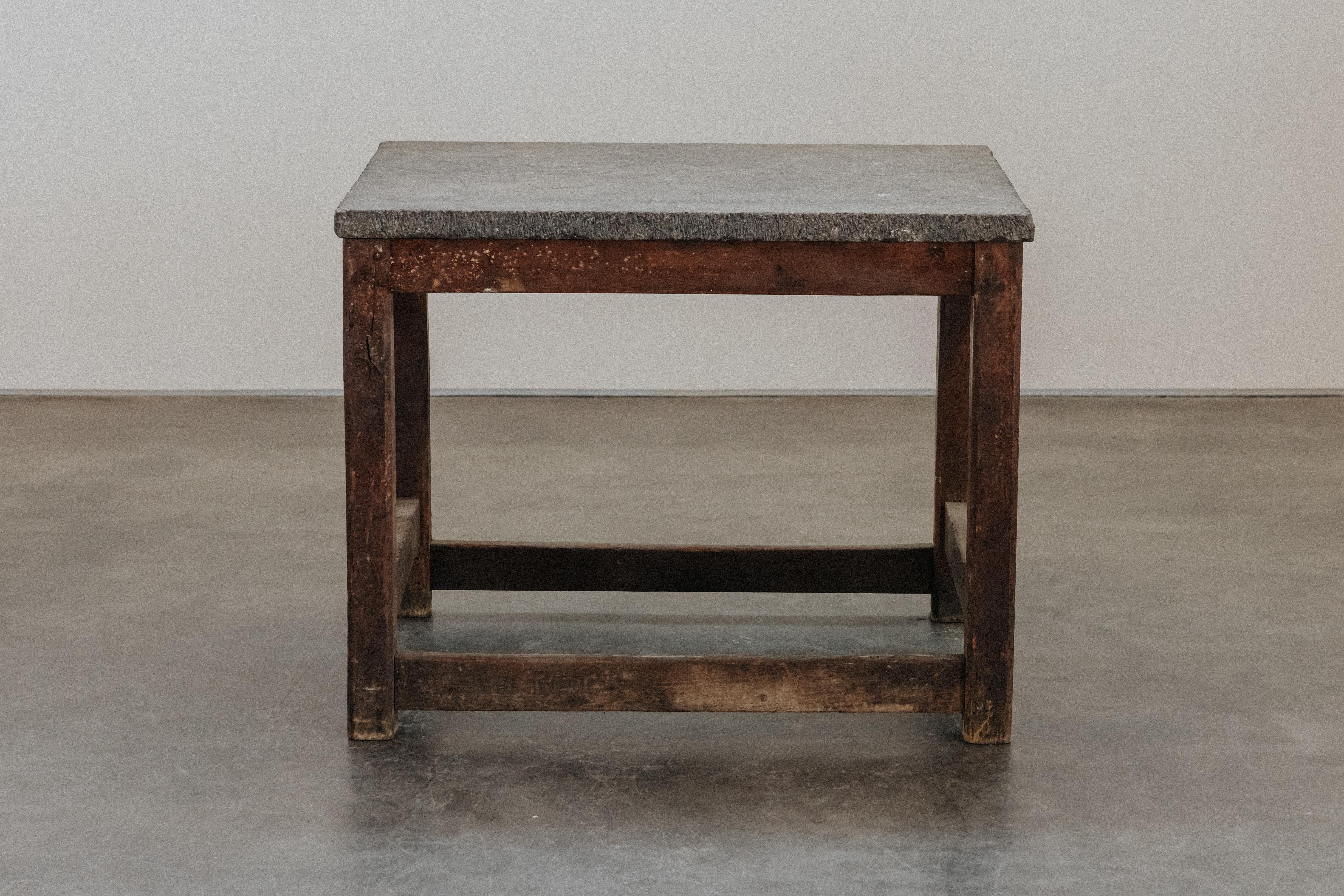 Vintage Bluestone Table From France, Circa 1940.  Solid bluestone top and oak base with great original patina and use.