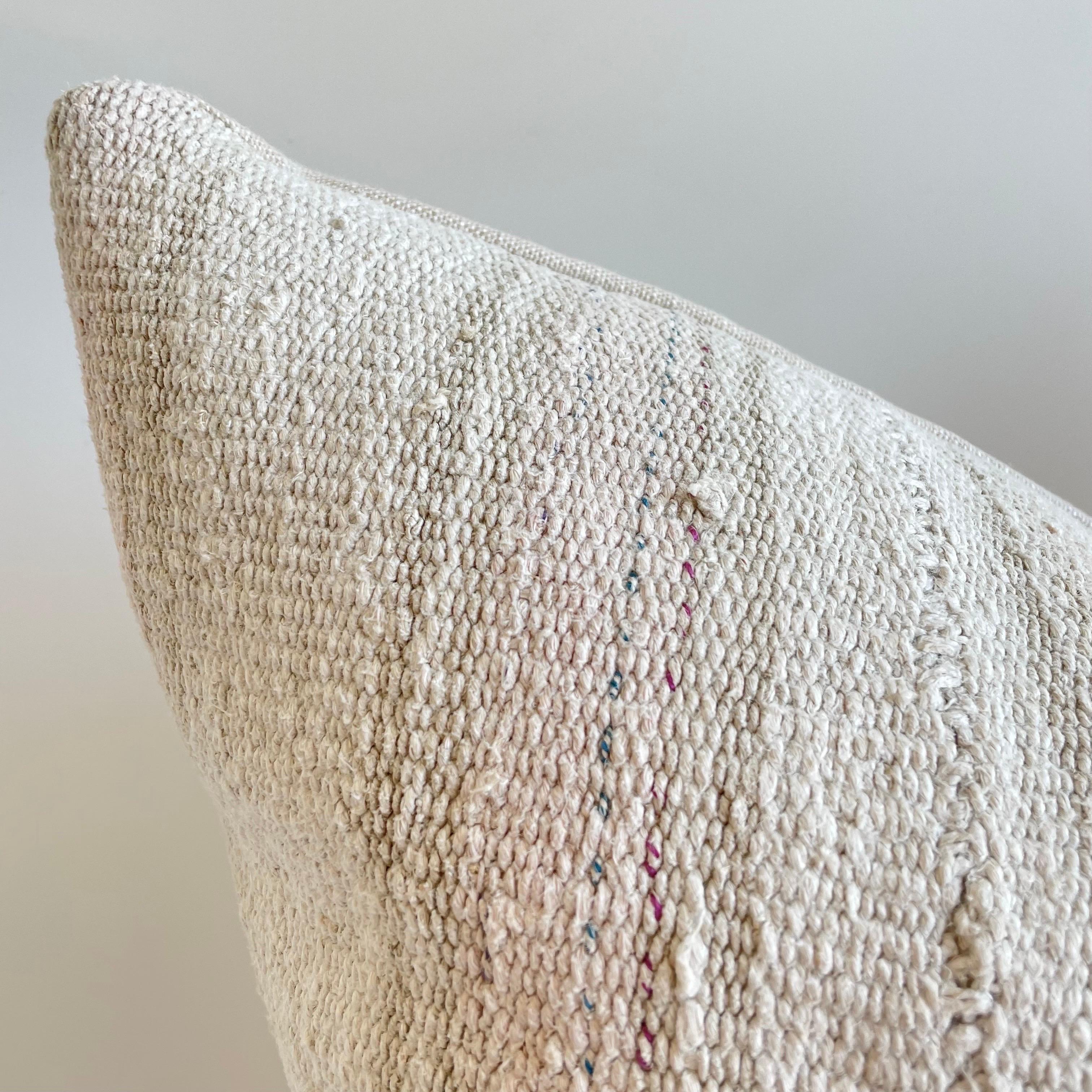 Custom Made Turkish rug Hemp pillow
Colors: Pale Blush and oatmeal / off white with linen natural stripes
Thick and soft to the touch. Pure Belgian Libeco linen backing
Solid Brass and metal zipper pulls, finished with an overlocked edge to