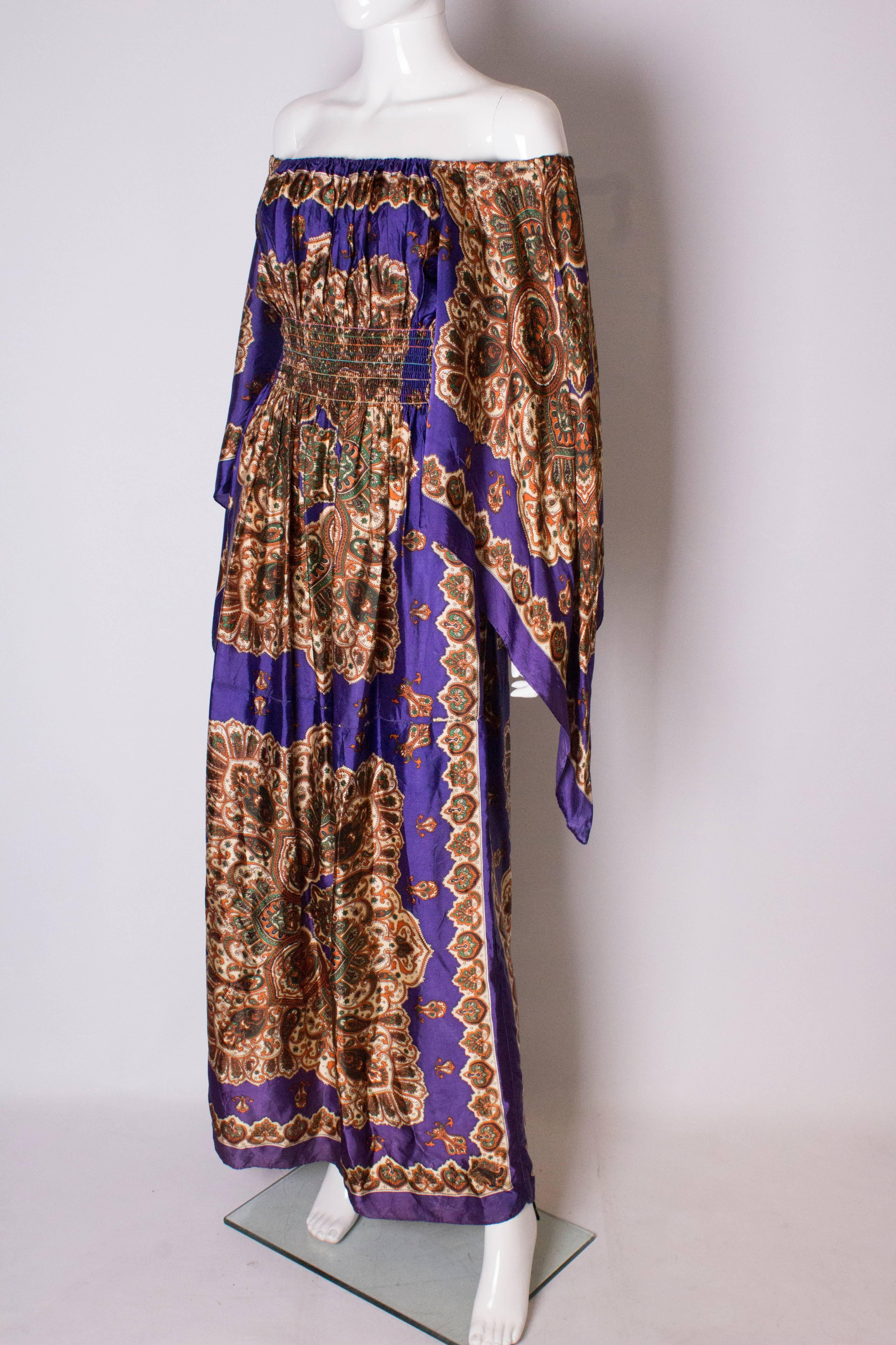 A Vintage 1970s full length printed off shoulder summer festival dress In Good Condition In London, GB