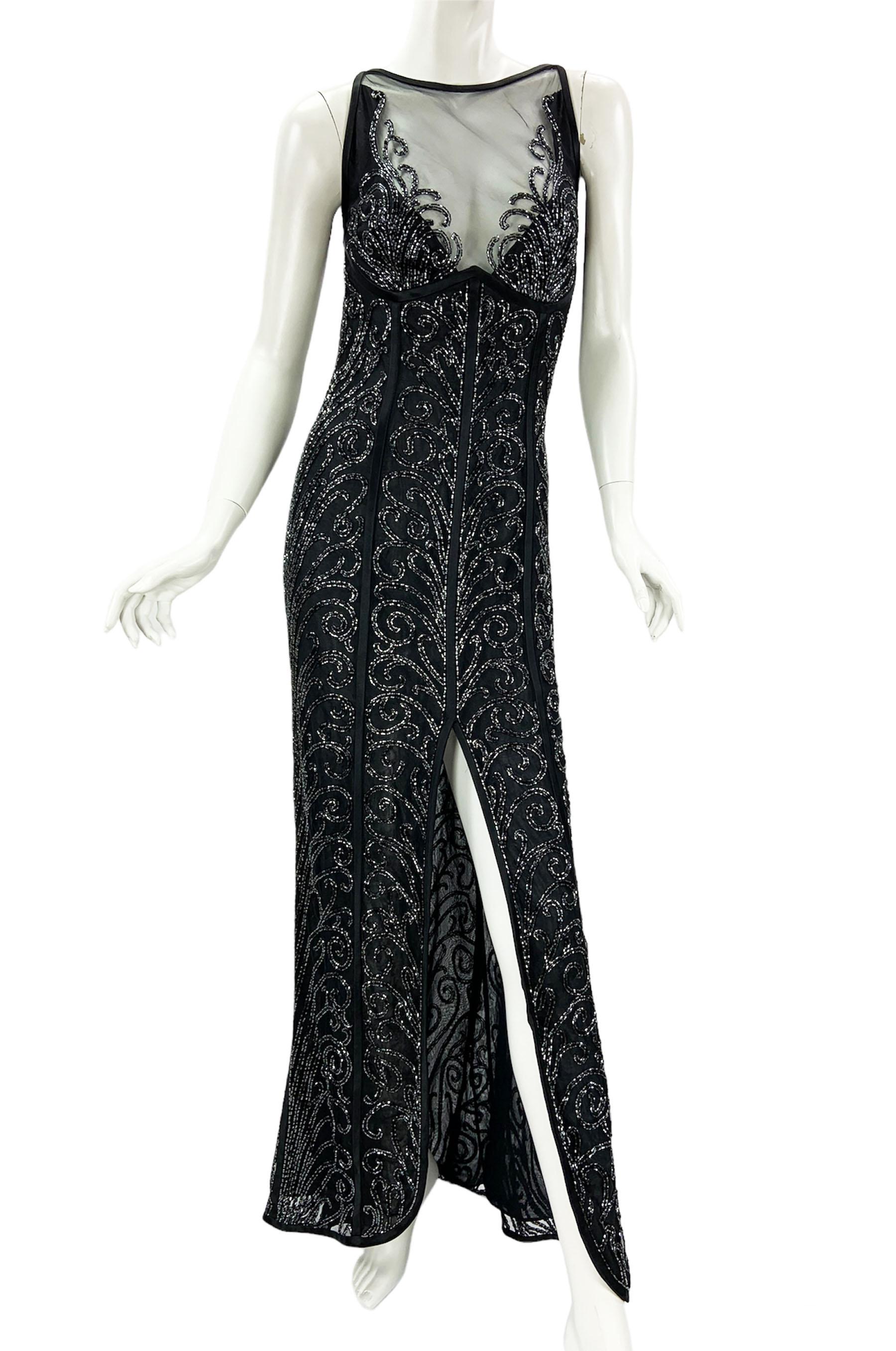 Vintage Bob Mackie Black Fully Beaded Tulle Dress Gown
US size - 12
Classy Black, Swirl Beads Design over the Tulle, Semi-Sheer,  
Fully Lined, Open Back, High Front Slit, Black Satin Trim, Zip Closure.
Measurements: Length - 59 inches front ( 62