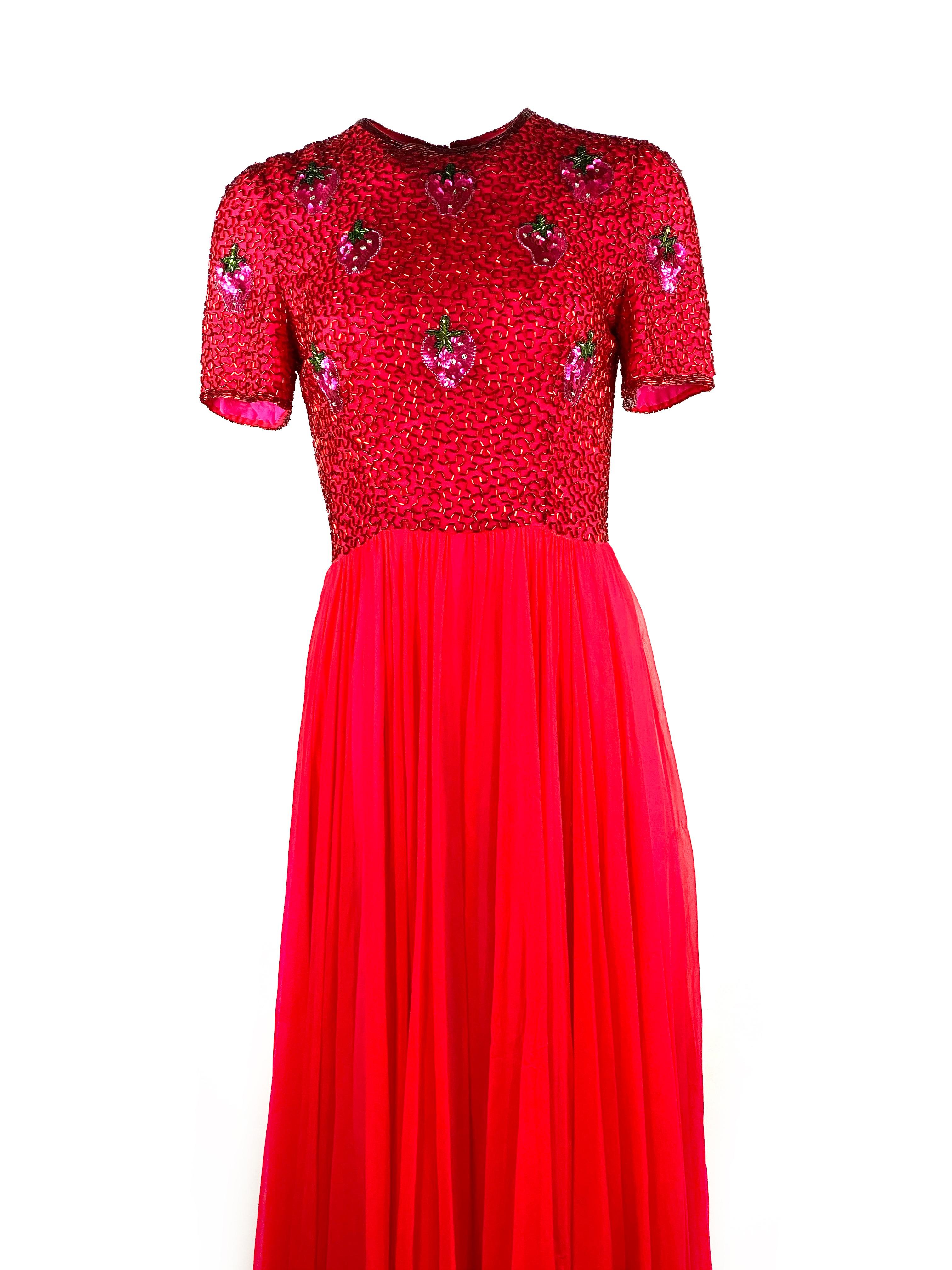 Vintage BOB MACKIE Red and Pink Strawberry Maxi Evening Dress Gown Size 10

Product details:
Size 10
Short sleeves, measure 8.75” from the shoulder
Featuring sequin strawberry pattern detail
Rear zip and hook closure
Made in USA
