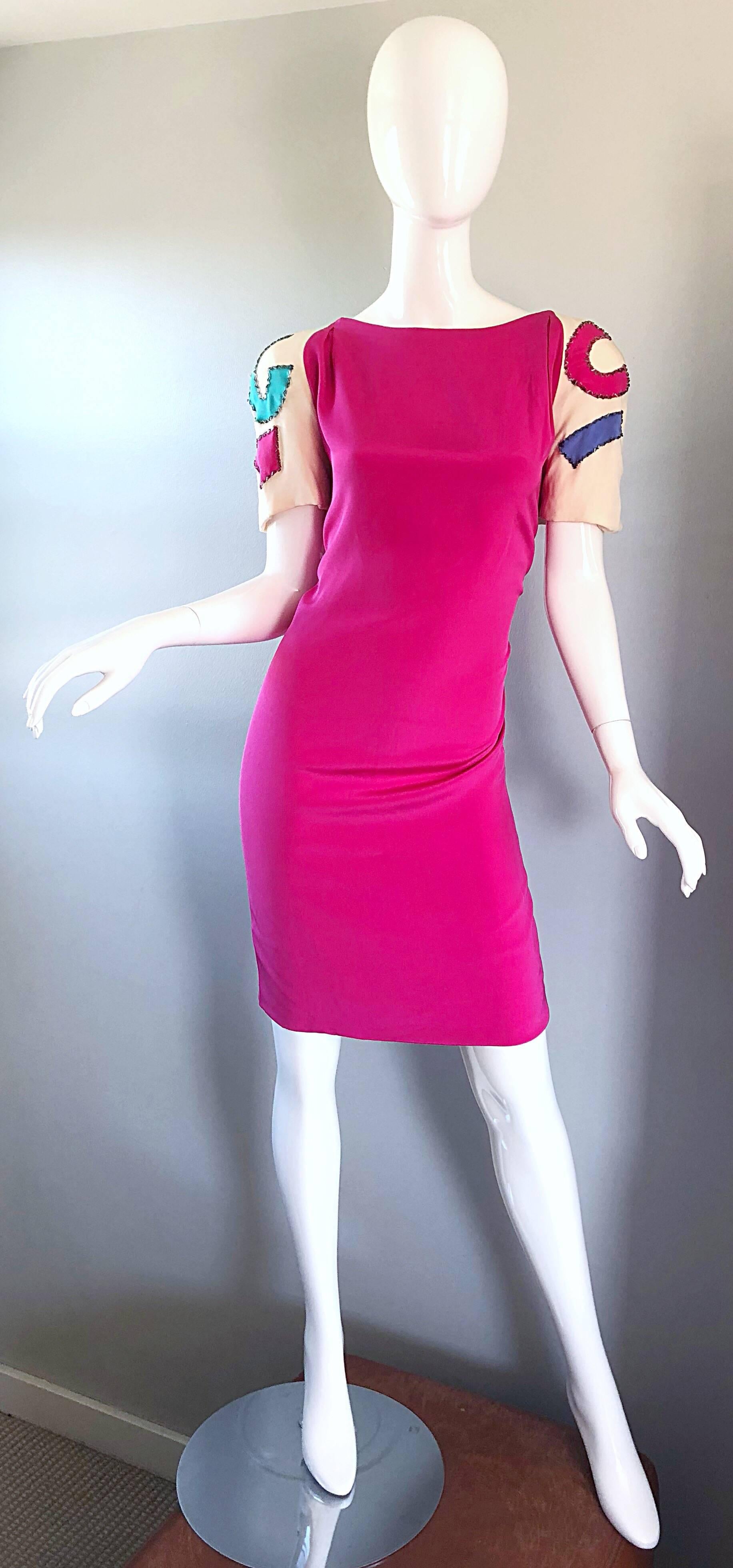 Perfect vintage 80s BOB MACKIE short sleeve hot pink and ivory beaded silk dress! Features a flattering hot pink silk body with ivory beaded silk sleeves. Purple, turquoise blue and fuchsia abstract shapes encrusted with beads on the sleeves. Hidden