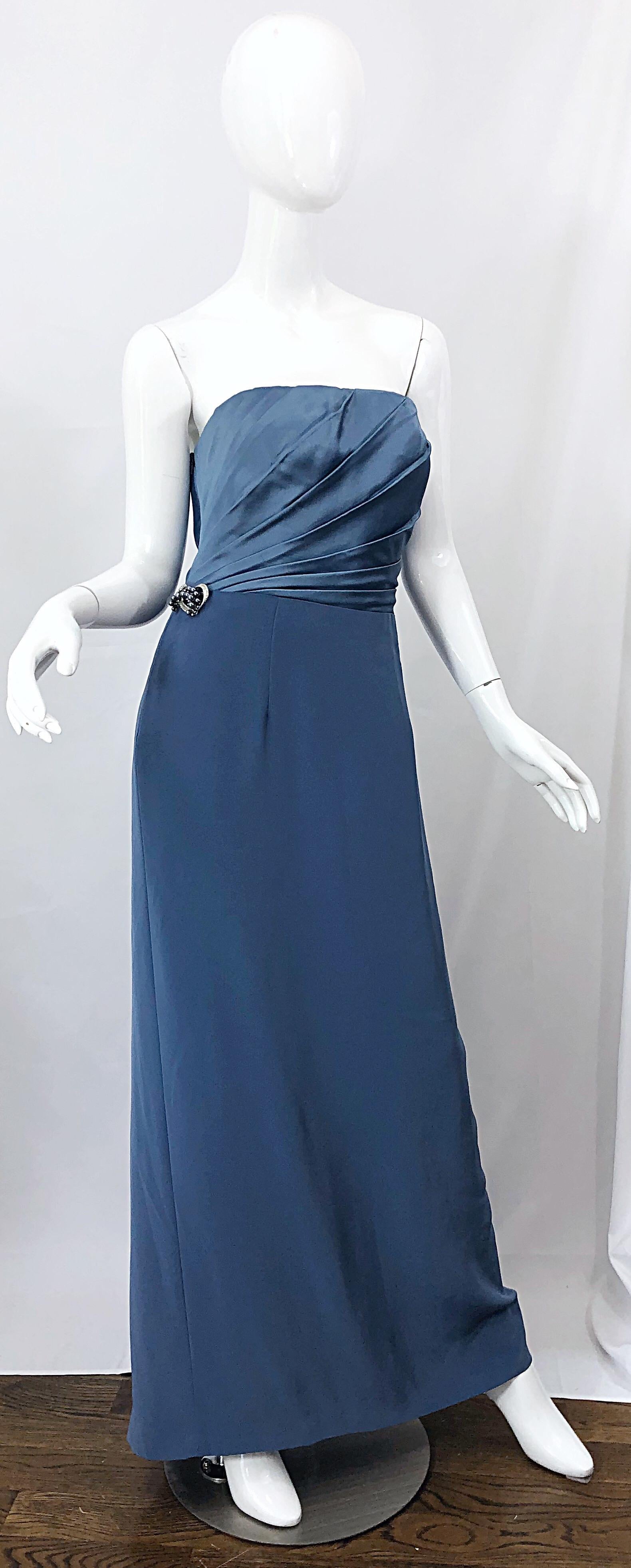 Incredible vintage 1980s BOB MACKIE blue Size 12 strapless silk crepe gown! This dress is spectacular in person! Super flattering, and the perfect shade of blue. Fully lined. Hidden zipper up the side with 
hook-and-eye closure. Attached pearl,