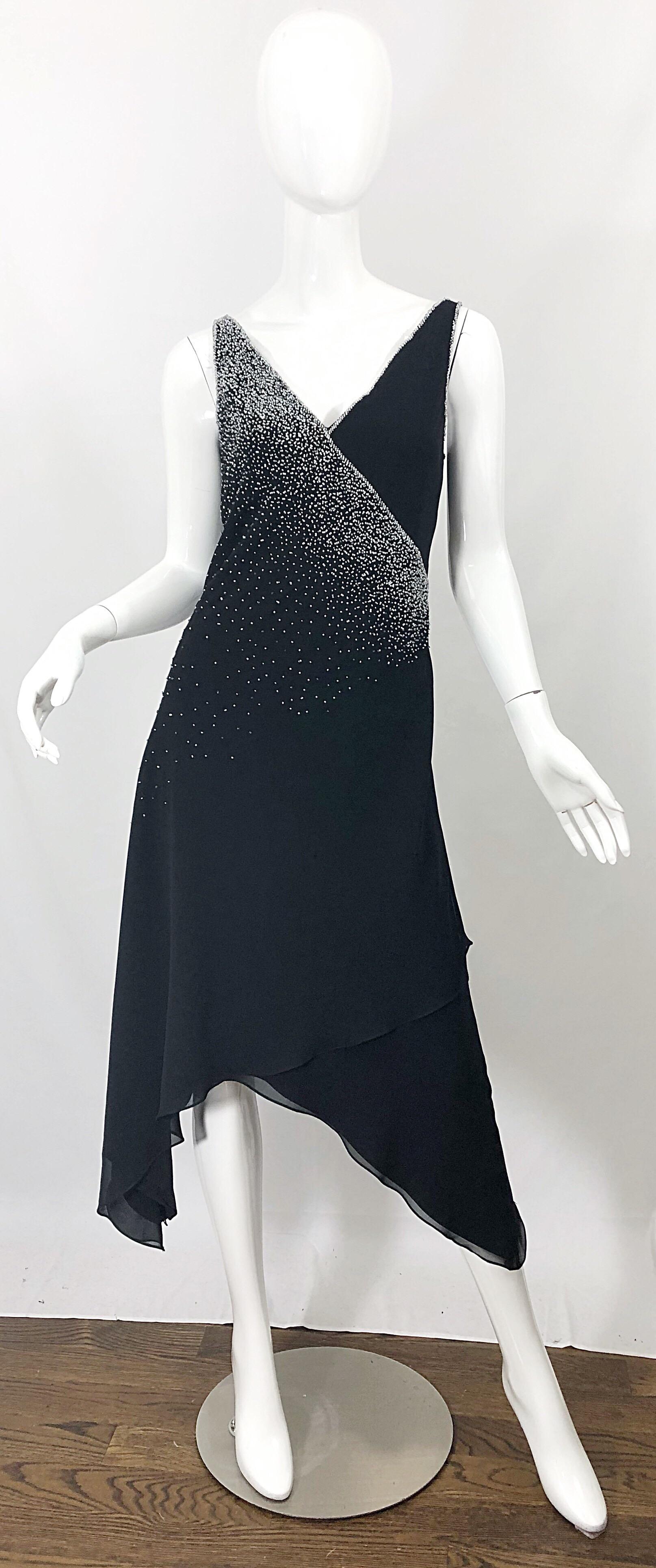 Beautiful vintage 90s BOB MACKIE black silk chiffon hi-lo dress! Hundreds of hand-sewn silver beads throughout. Hidden zipper up the back with hook-and-eye closure. The perfect timeless black dress that offers so much style. Very well made, with