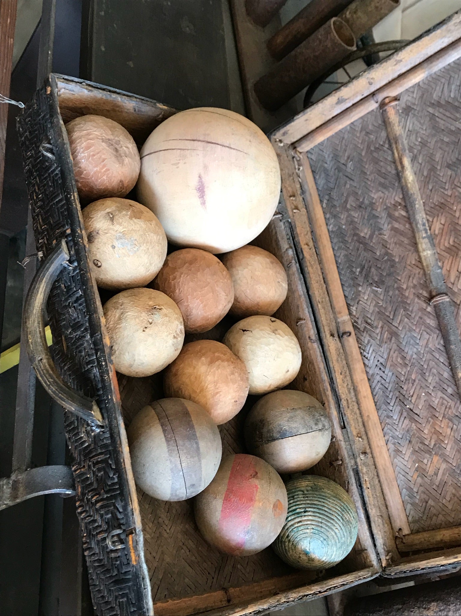 Vintage set of bocce balls

1 large, 7 small, 4 croquet - 12 total vintage condition.