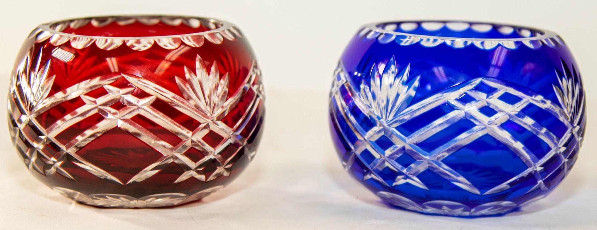 Vintage Bohemian Cobalt Blue and Ruby Red Cut to Clear Crystal Votive Candle Holder.
Set of two Bohemian cut crystal votive holder in cobalt blue and ruby red color cut to clear and decorated with hand cut stars.
Perfect for adding soft lighting