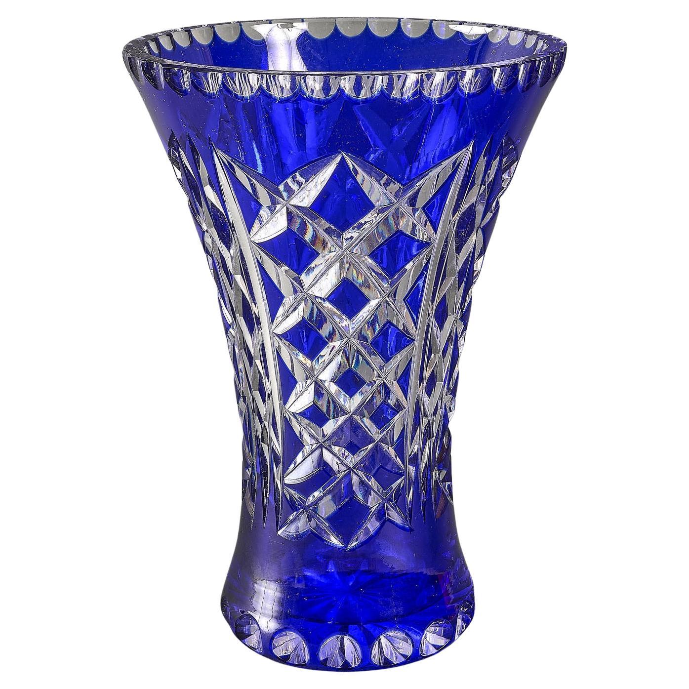 Wonderful Bohemian cut glass royal cobalt blue crystal flared trumpet formed vase 
A beautiful piece with cut details from top to bottom, cut to clear, cobalt blue Bohemian glass vase from Czechoslovakia with diamond pattern with a decorative cut