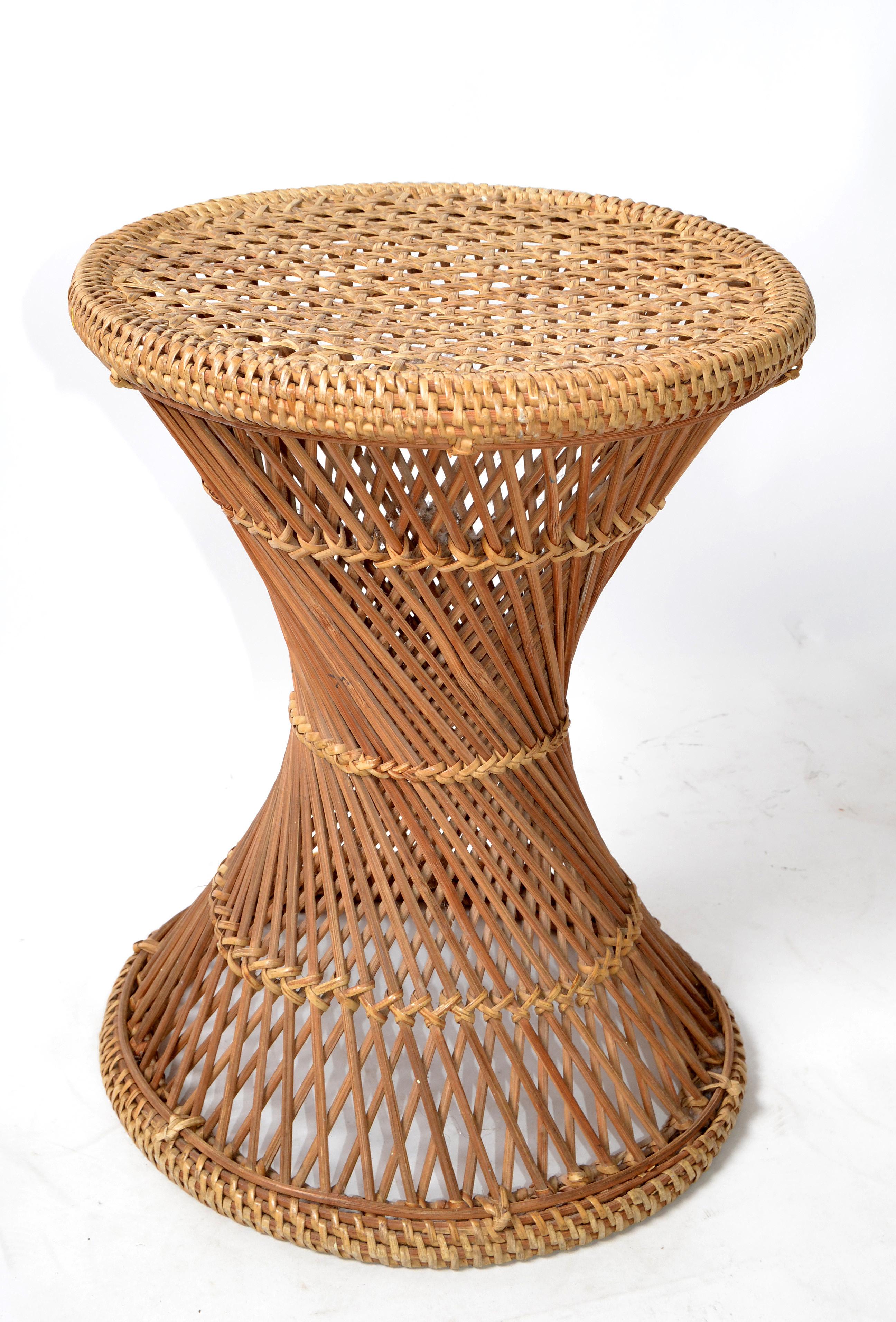 All handwoven wicker and rattan drum table, side table, drink table or stool in Bohemian period style.
Top diameter measures: 13.75 inches.
Height: 18 inches.