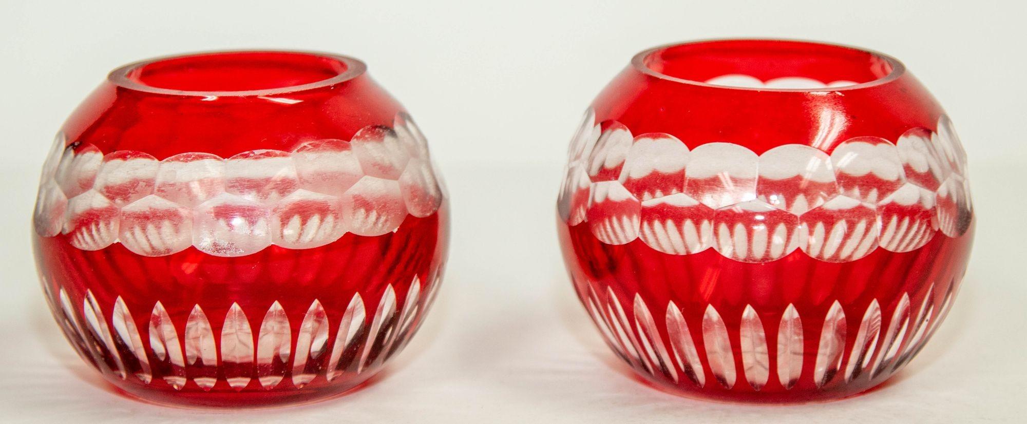 Vintage Bohemian Faberge style cut to clear crystal votive candle holder.
Pair of ruby cut to clear crystal tea light holders, ruby cut glass votives.
Set of two Bohemian votive ruby red cut crystal votive holder.
Great to use with votive candle