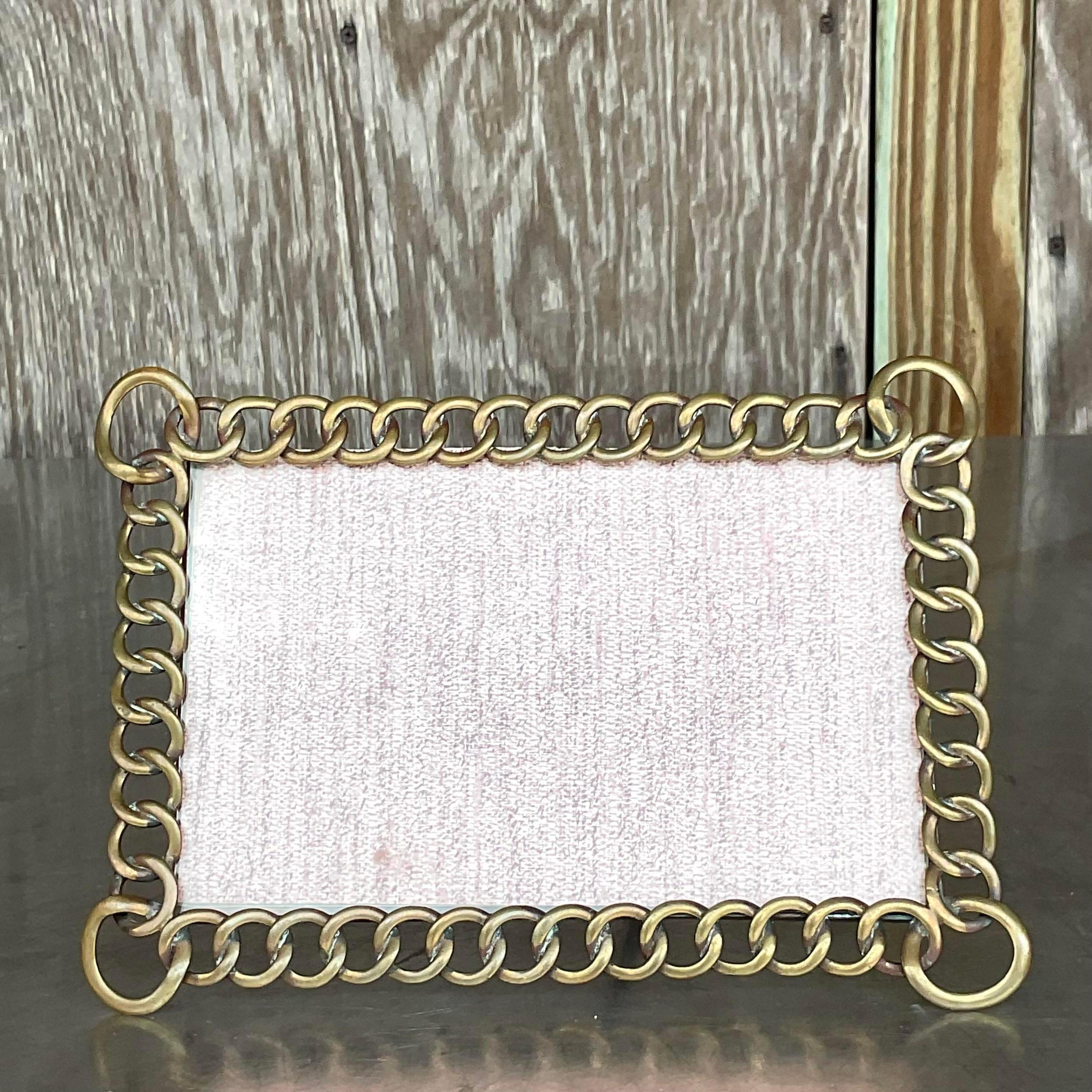 A fantastic vintage Boho horizontal picture frame. A chic brass ring design. Handcrafted in 1870. Acquired from a Palm Beach estate.