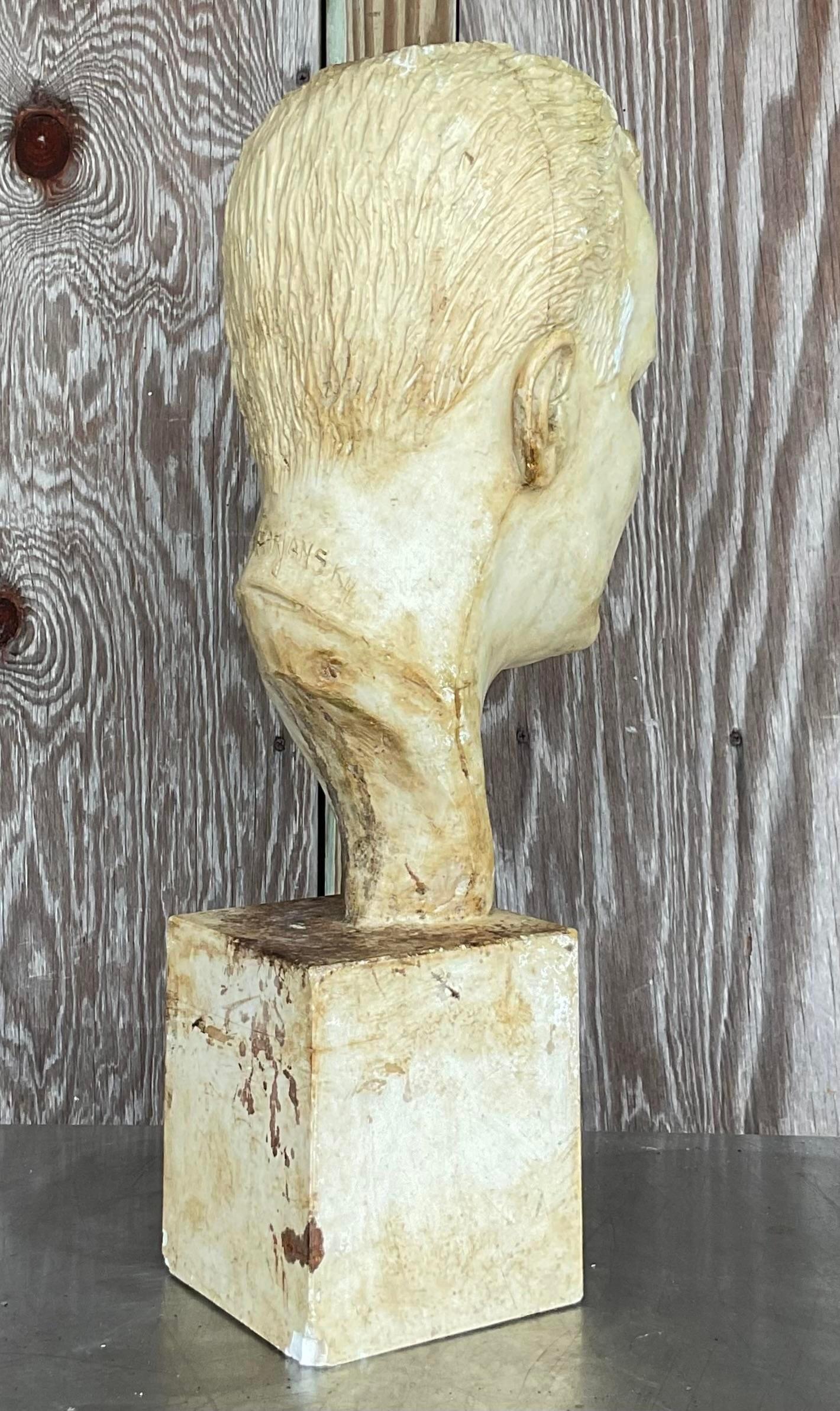 A fantastic vintage Boho plaster bust of man. A chic 1949 plaster composition signed on the back of the neck. An awesome all over patina from time. Easily cleaned up with a coat of white paint if you prefer. Acquired from a Palm Beach estate.