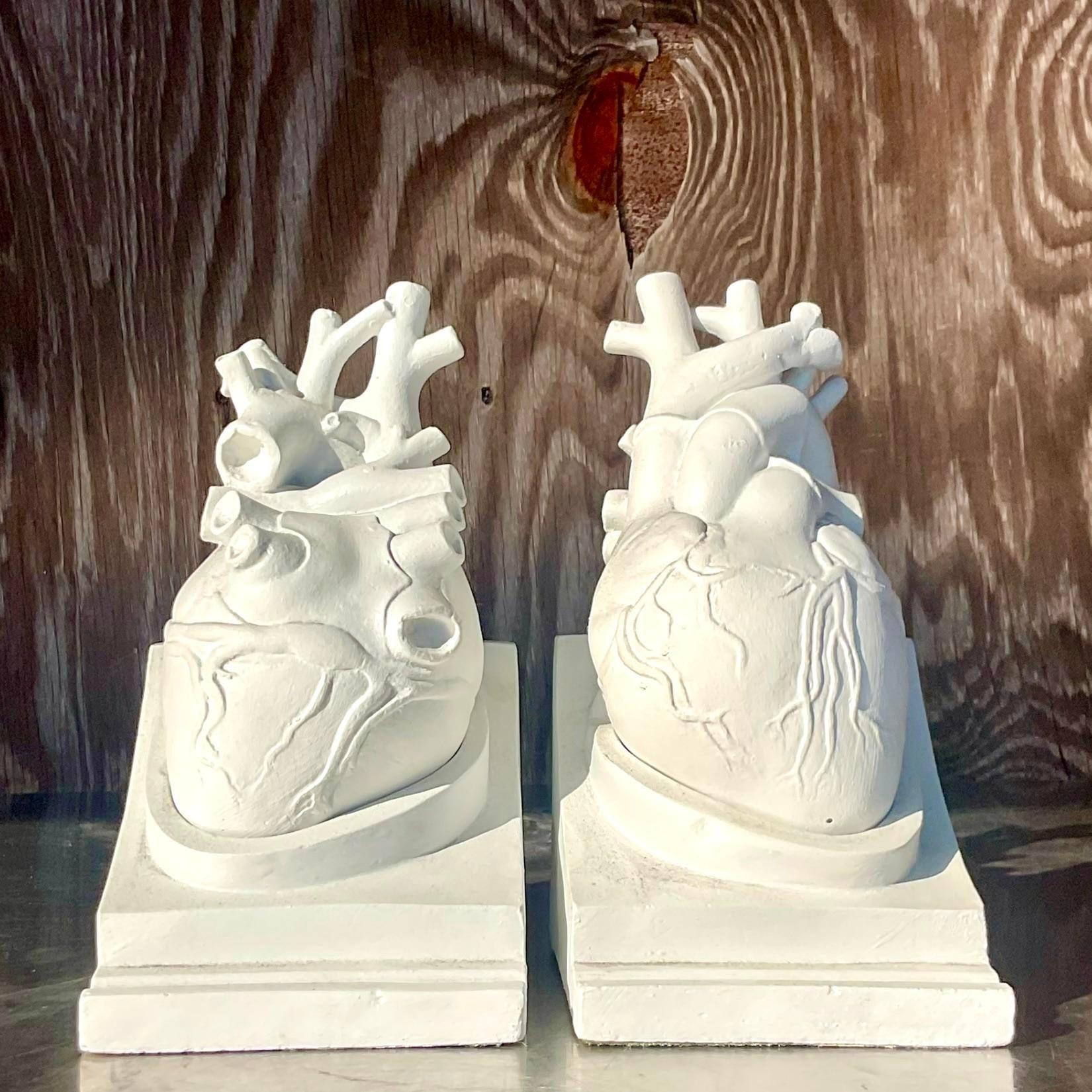 An exceptional vintage pair of Boho plaster bookends. Amazing realistic hearts that rest in a plinth. Tagged Goldman and Belski 1950. The perfect gift for the MD in your life. Acquired from a Palm Beach estate.