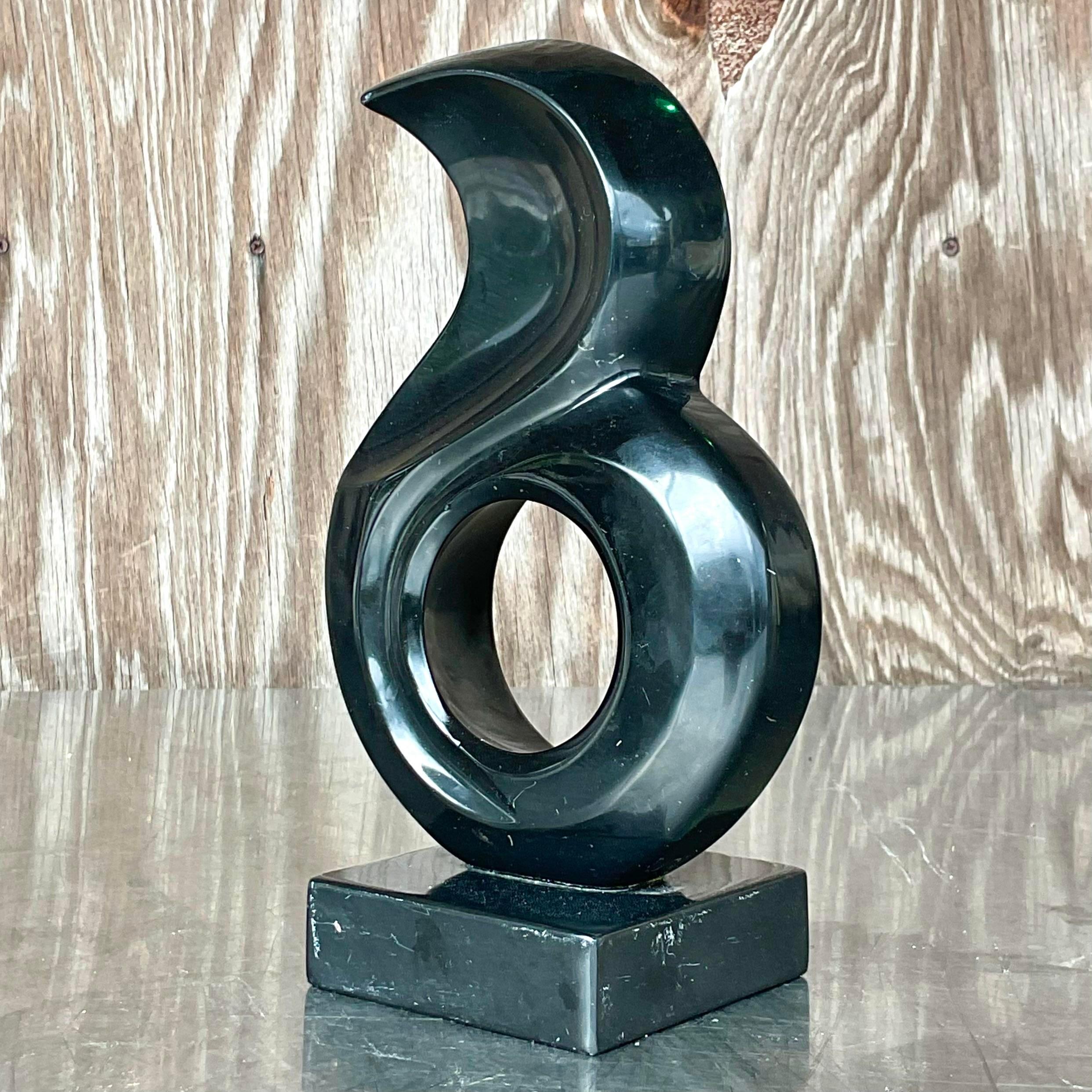 A beautiful vintage Boho stone sculpture. A dramatic black abstract composition. Unsigned. Acquired from a Palm Beach estate.