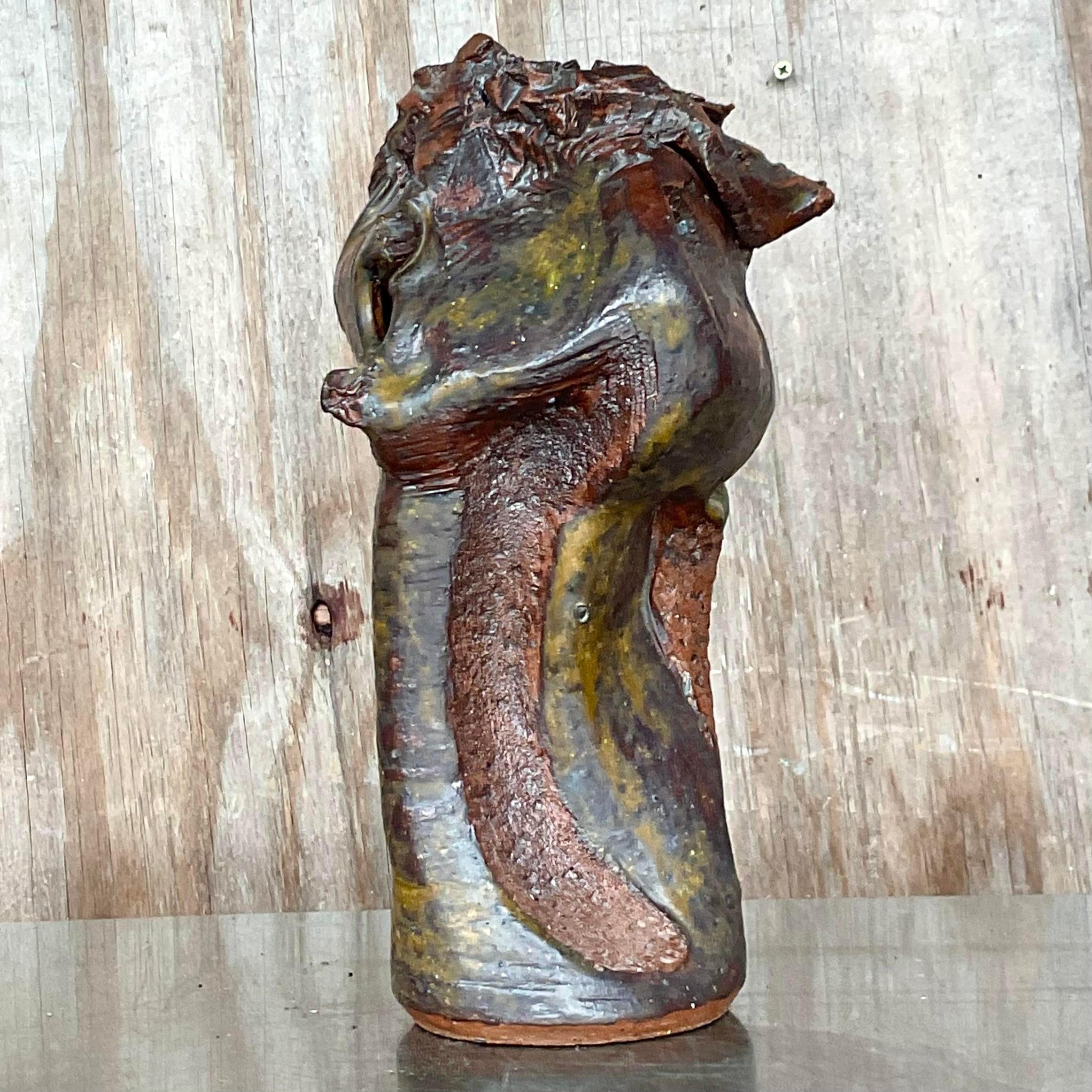 The most incredible vintage Boho studio pottery vase. A chic Abstract composition with lots of gnarly twists and turns. A combo of matte and glazed finishes. Signed on the bottom. Acquired from a Palm Beach estate.
