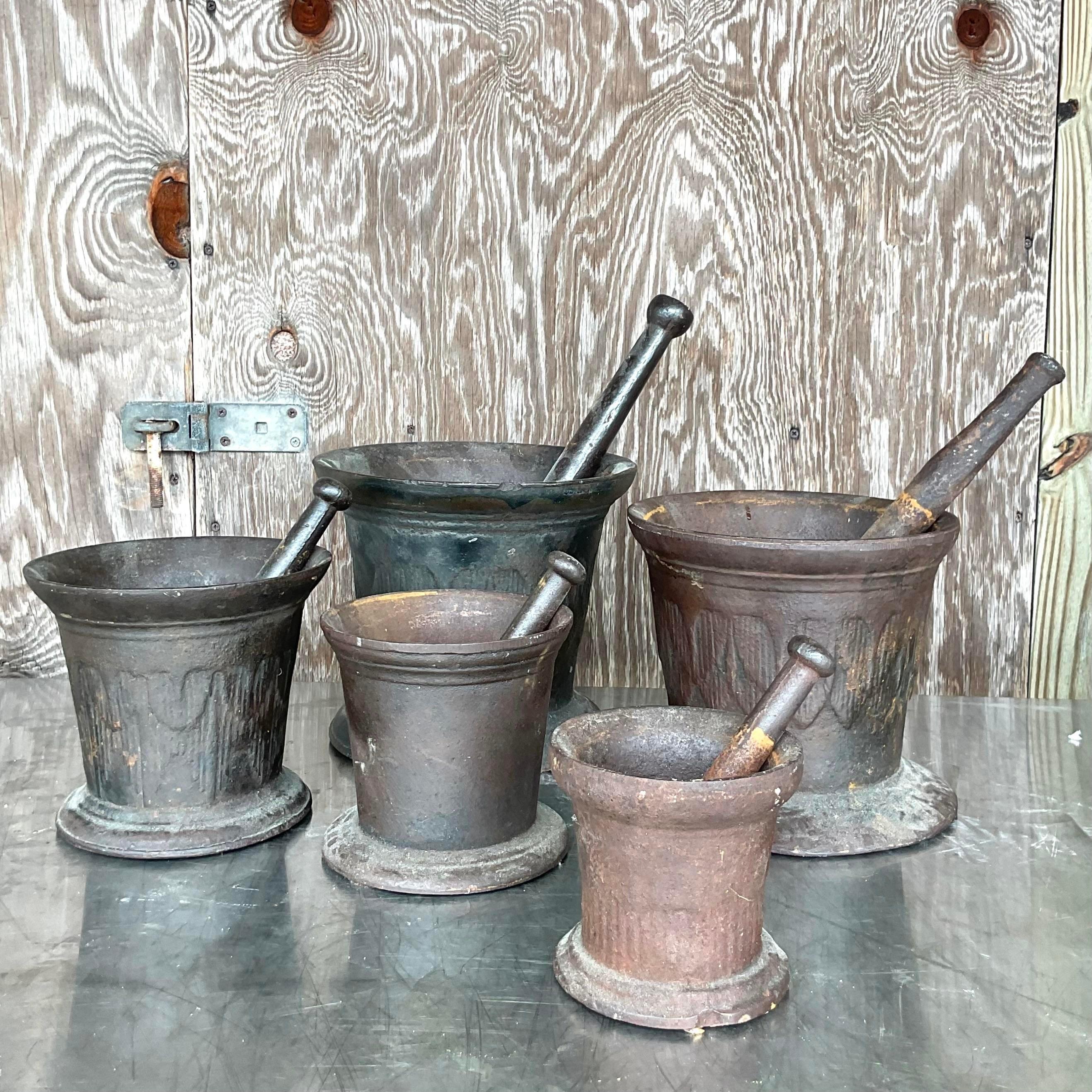 Incredible set of 5 Boho mortar and pestles. Beautiful wrought iron vessels from back it the days of your corner Apothecary. A range of sizes and designs. Acquired from a NYC estate.
Dimensions:
(Mortar and pestles have been labeled in last picture