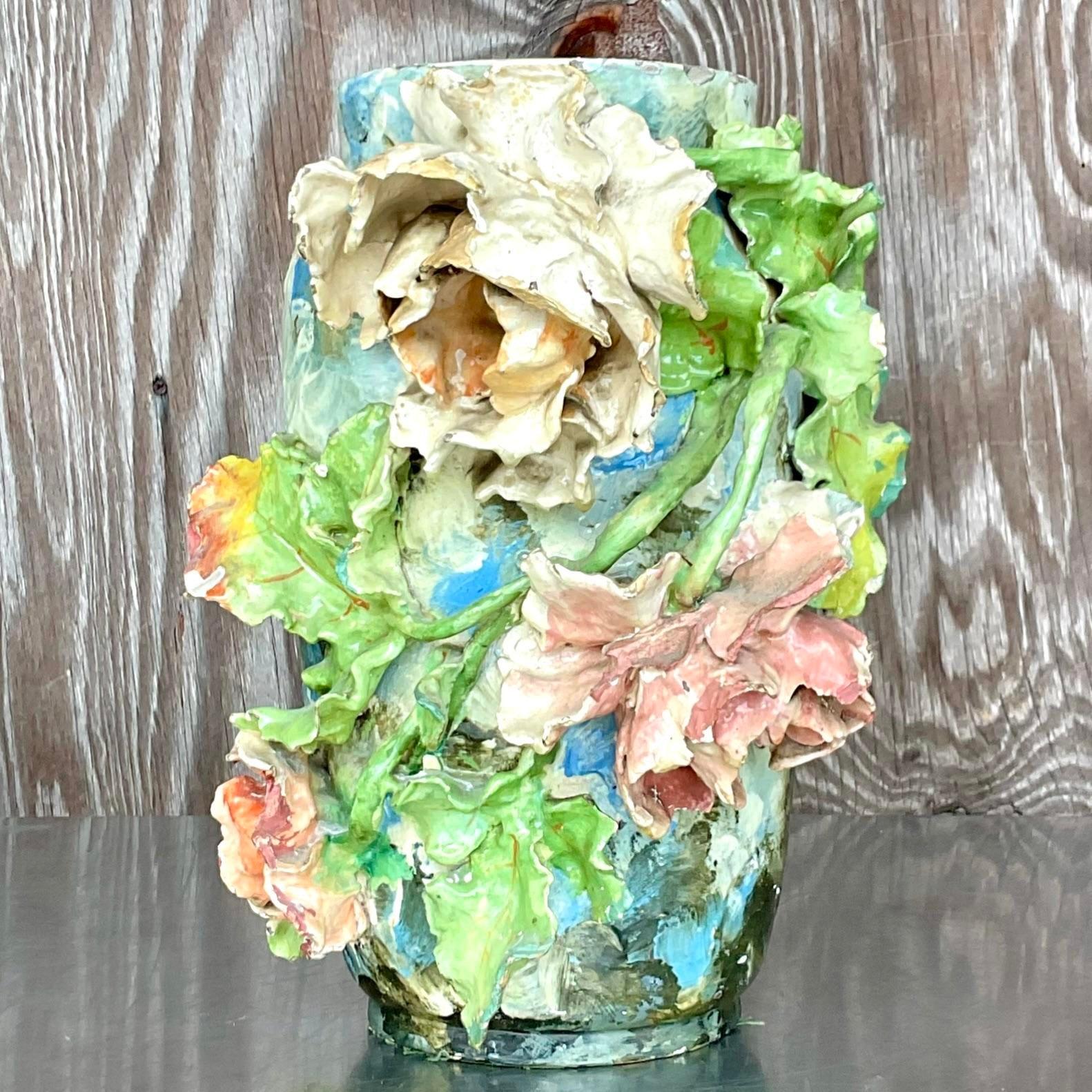 An incredible hand painted flower vase. Artisan slab built flowers on vase. Hand painted in soft clear colors. Acquired from a Palm Beach estate.