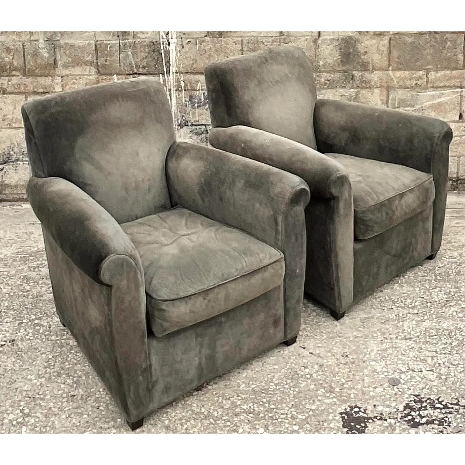 Incredible pair of vintage club chairs. Made by the iconic Baker Furniture group in collaboration with Coach leather goods. A beautiful smoke colored suede with lots of chic patina from time. Like a well loved leather jacket. Tagged by both Coach