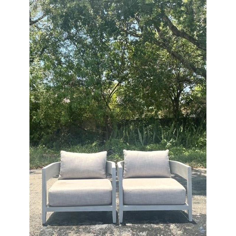 Capture the essence of sophisticated coastal living with this stunning pair of lounge chairs, designed in the iconic style of Restoration Hardware's 