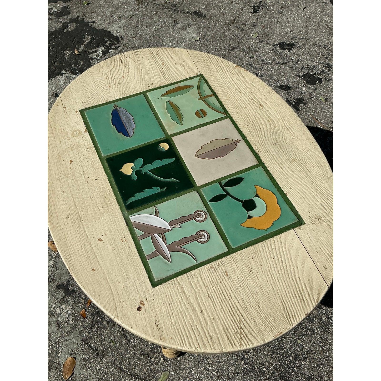 This charming vintage boho table features a beautifully crafted barley twist base paired with an eye-catching inset tile top. The intricate turned legs add a touch of old-world craftsmanship, while the hand-painted ceramic tile centerpiece