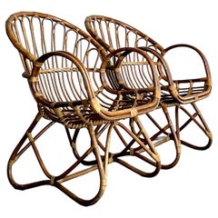 Vintage Boho Bent Rattan Lounge Chairs - A Pair