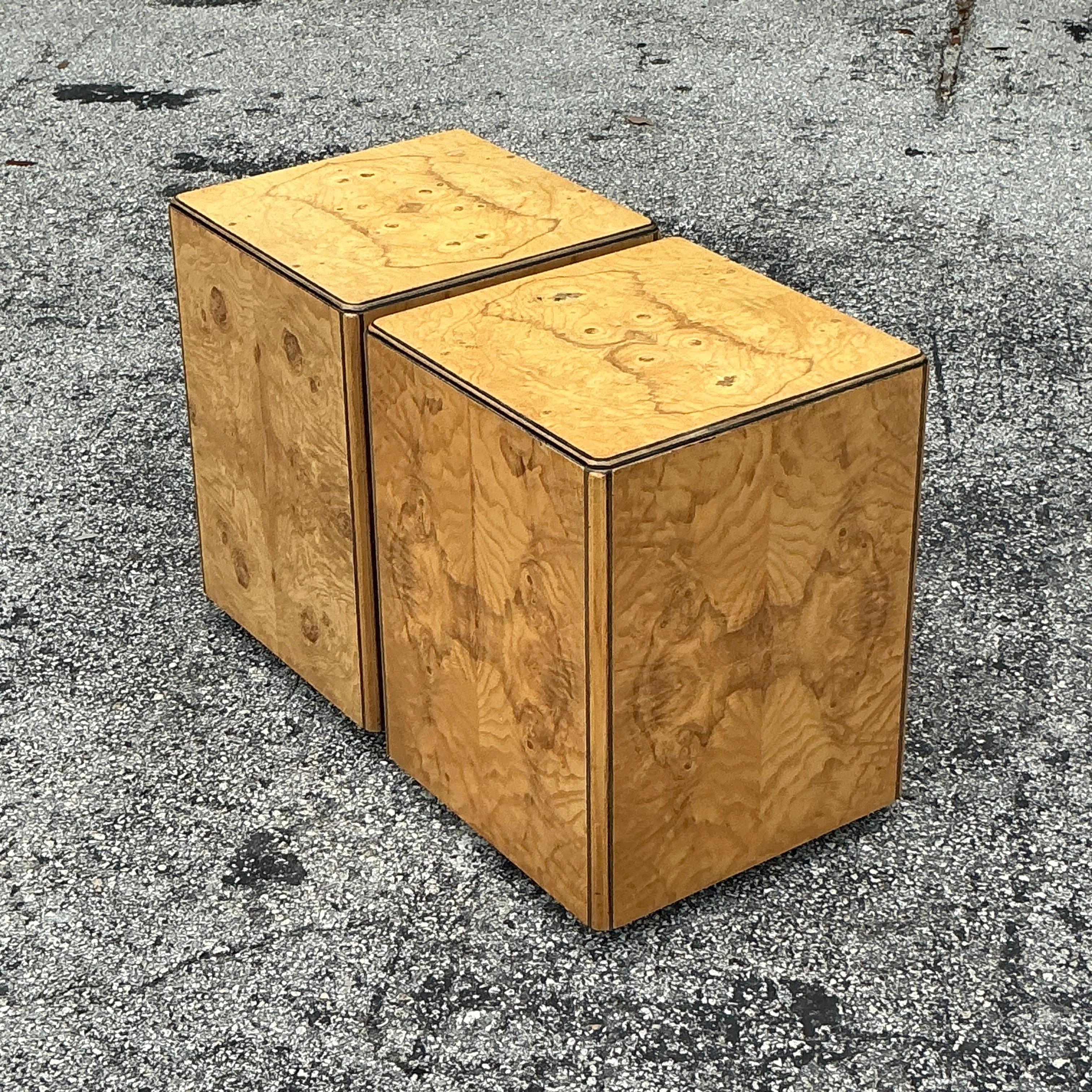 Bring bohemian flair to your space with Vintage Boho Book Matched Burl Wood Cubes After Henredon. These unique pieces feature stunning burl wood patterns and versatile cube designs, perfect as chic side tables or stylish accents for a touch of retro