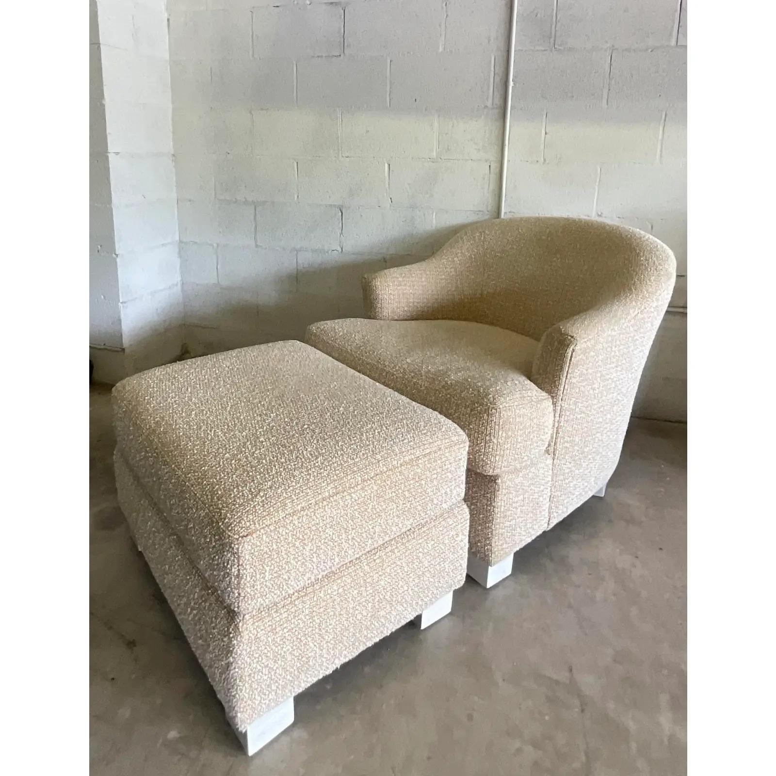 Fantastic vintage Boho Boucle chair and ottoman. Beautiful gold boucle upholstery in chic neutral colors. White block feet. Acquired from a Palm Beach estate.